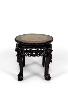 Asian low stand / side table in wood carved with Demons, marble top, 1880's
