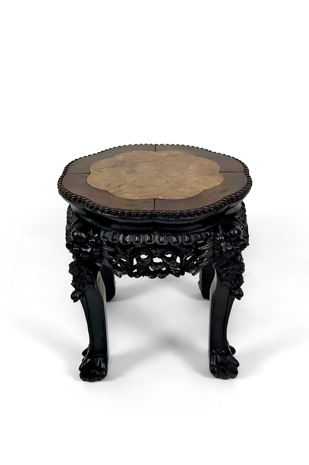 Carved Asian low stand / side table in wood carved with Demons, marble top, 1880's  For Sale