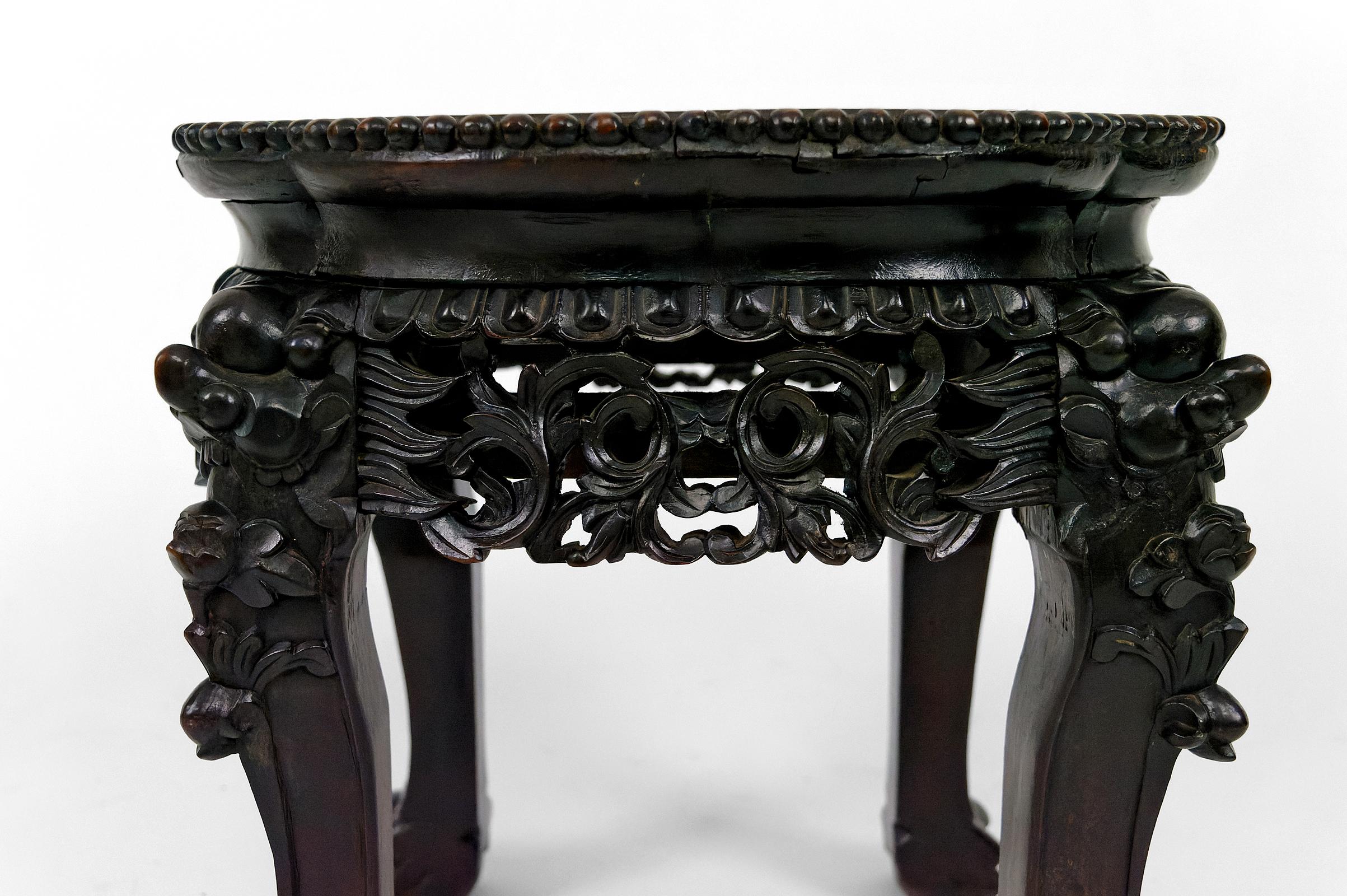 Late 19th Century Asian low stand / side table in wood carved with Demons, marble top, 1880's  For Sale