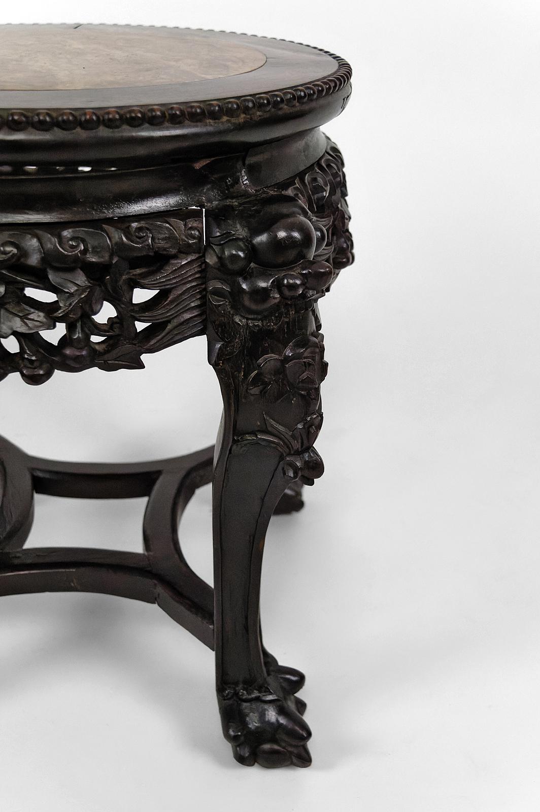 Carved  Asian low stand / side table in wood carved with Demons, marble top, Circa 1880 For Sale