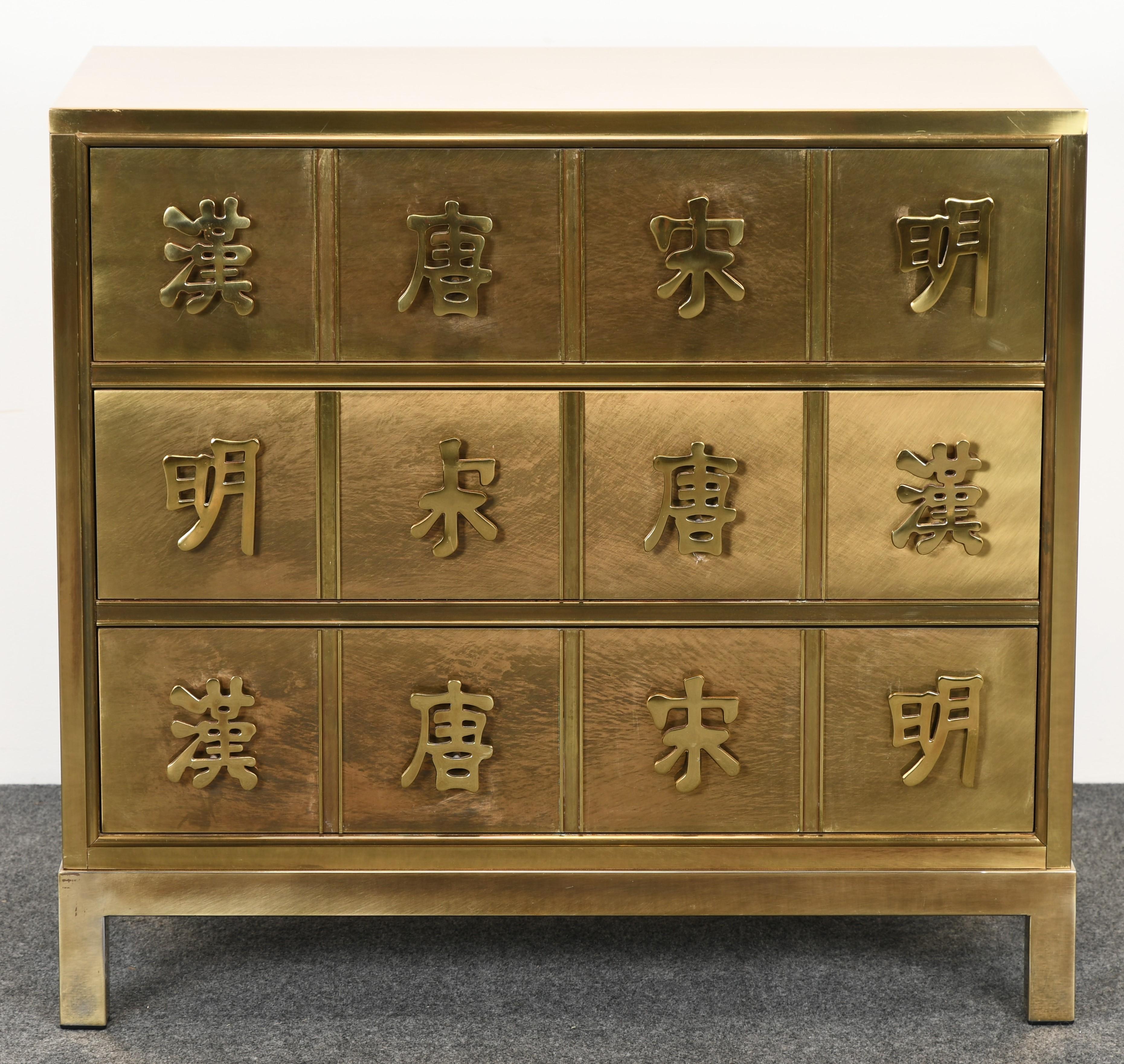 A decorative brass chest by Mastercraft with an Asian motif handles. The chest consists of three drawers for ample storage. Great small scale size for the perfect space. The chest is in good condition with age-appropriate wear. Some variances in