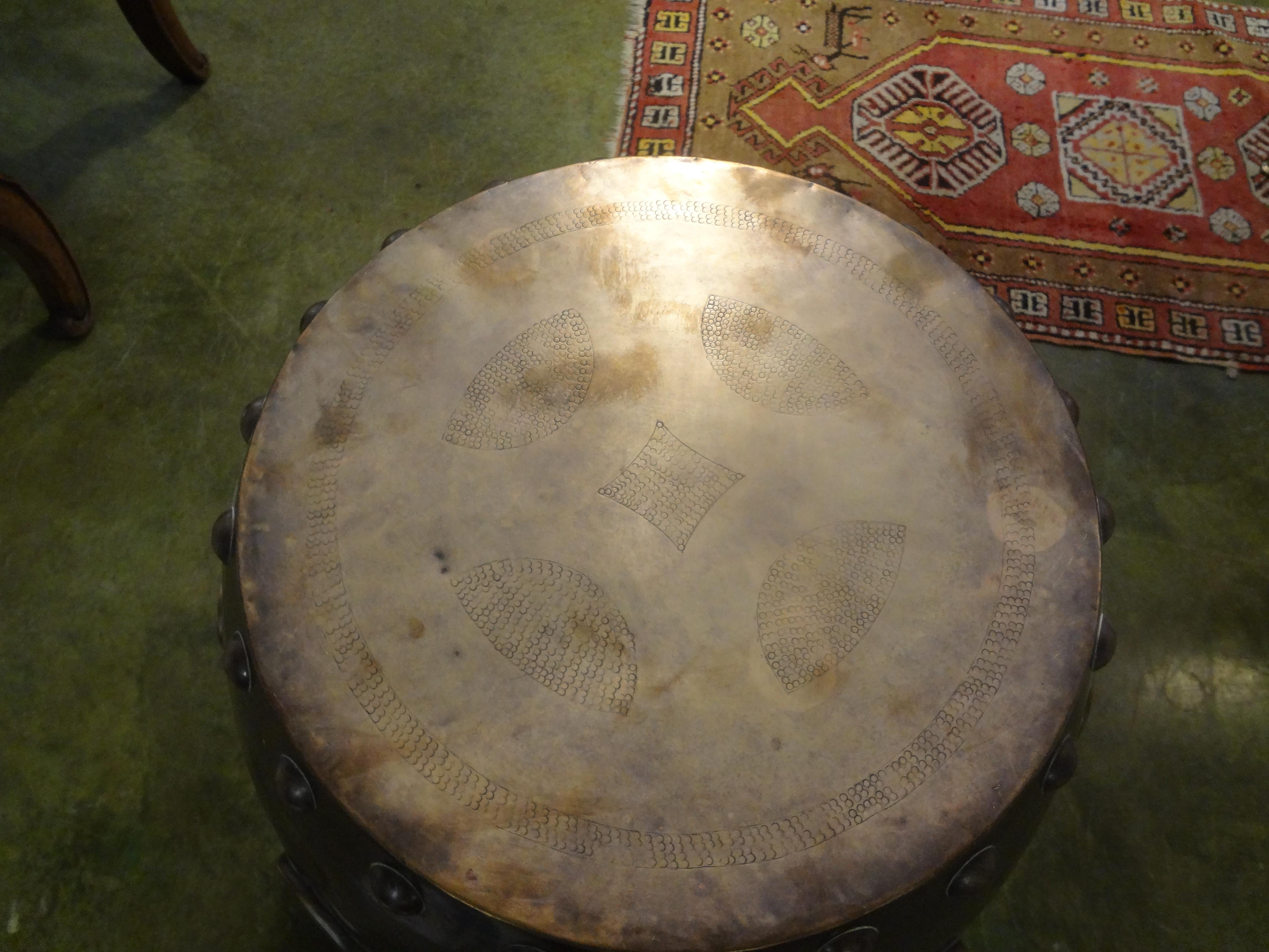 Large scale Hollywood Regency or Asian Modern brass garden stool, garden seat or table. This brass table would work well in a variety of interiors. Tony Duquette used them in many of his interiors. It was made in Hong Kong and dates from