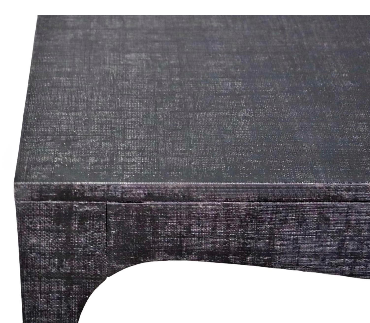 This is a 1970s modern Karl Springer style grass cloth wrapped coffee table. It is in very good condition. 

My shipping is running two to five weeks. Because of ferry issues, for locations like Nantucket, we ship to a receiving facility in Hyannis.