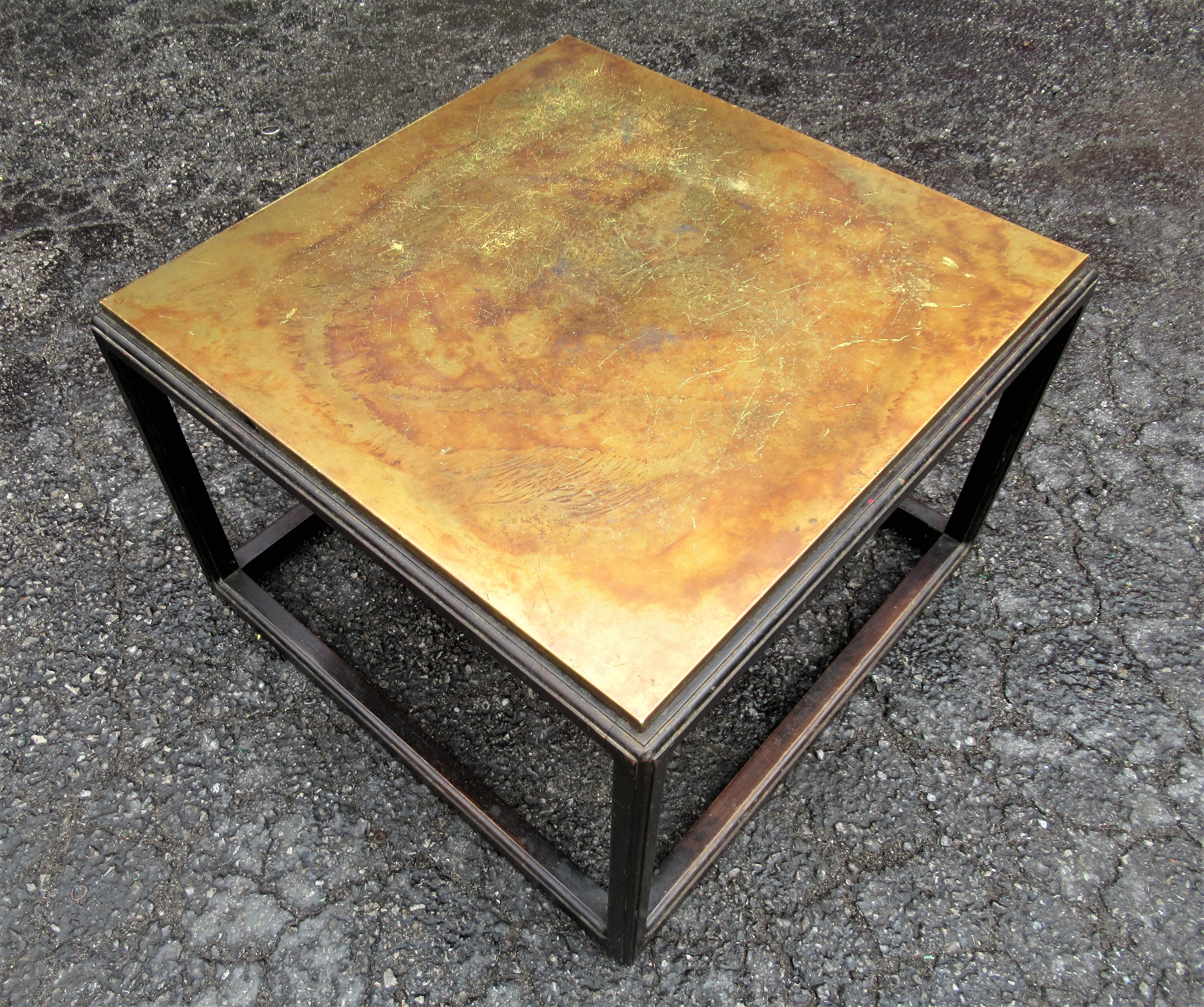 Asian modern style square coffee table with walnut base in partially ebonized stain finish and original copper top. Attributed to or in the style of John Stuart Inc. furniture retailers. Beautiful simple timeless design. Look at all pictures and