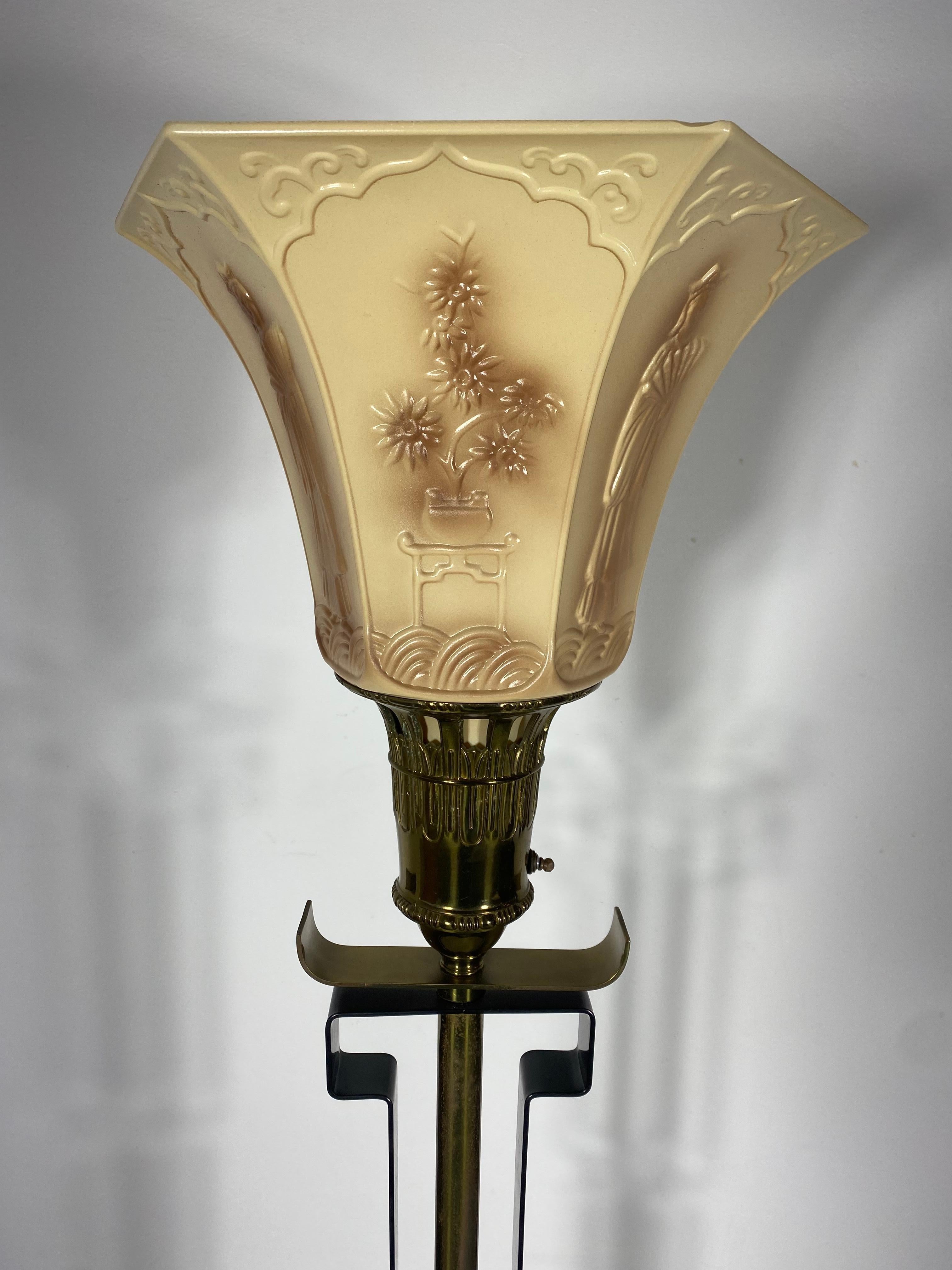 Stunning Asian Modernist Torchere / floor lamp. Attributed to James Mont 1940s, Classic form, Black lacquered metal standard ,brass ornamentation, detailing. Amazing embossed glass shade boasting oriental woman and floral design. 3-way switch light