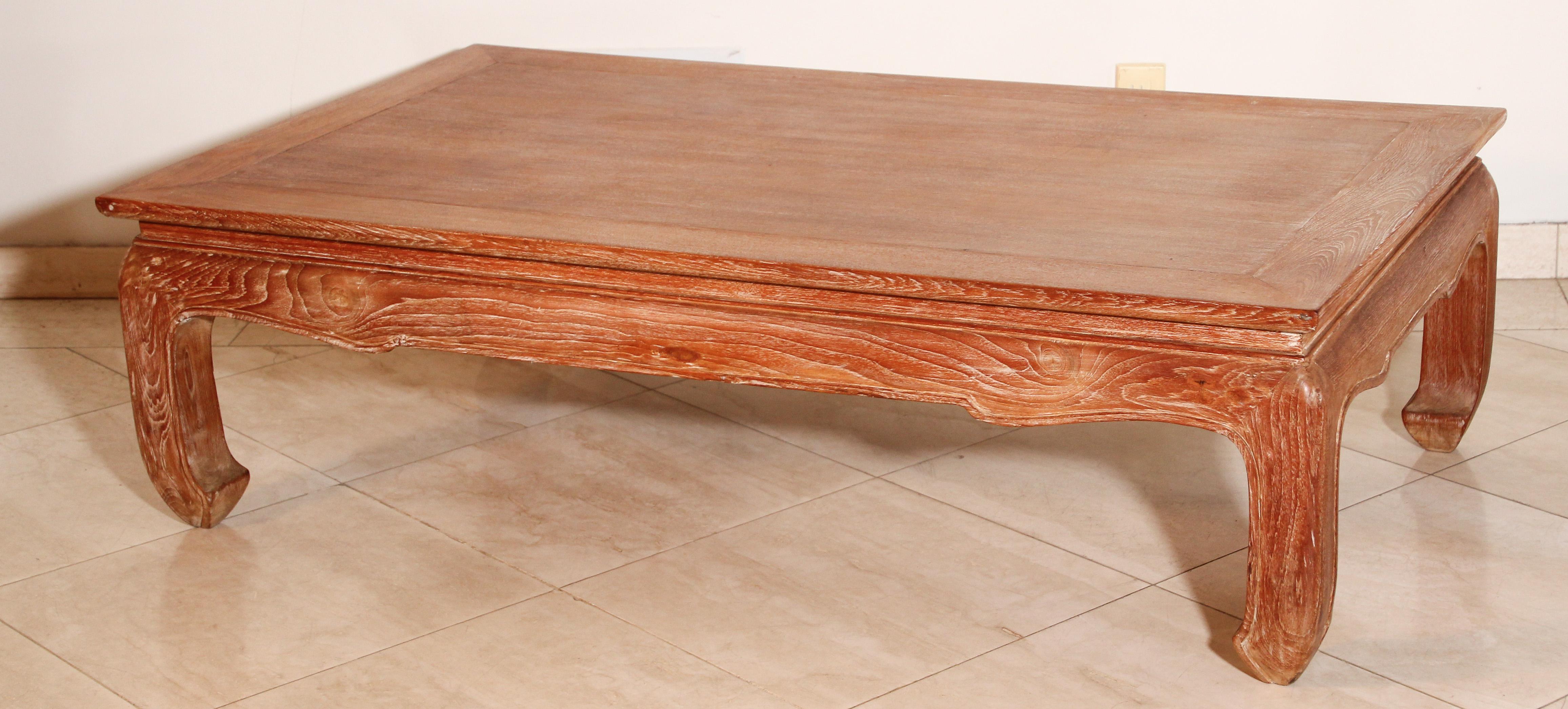 Large Asian opium teak wood rectangular coffee table.
Large rounded very nicely carved legs and sides and the corners.
Low bajot table with beautiful signs of age and use.
Classic curved inward four legs coffee table. The Opium coffee table