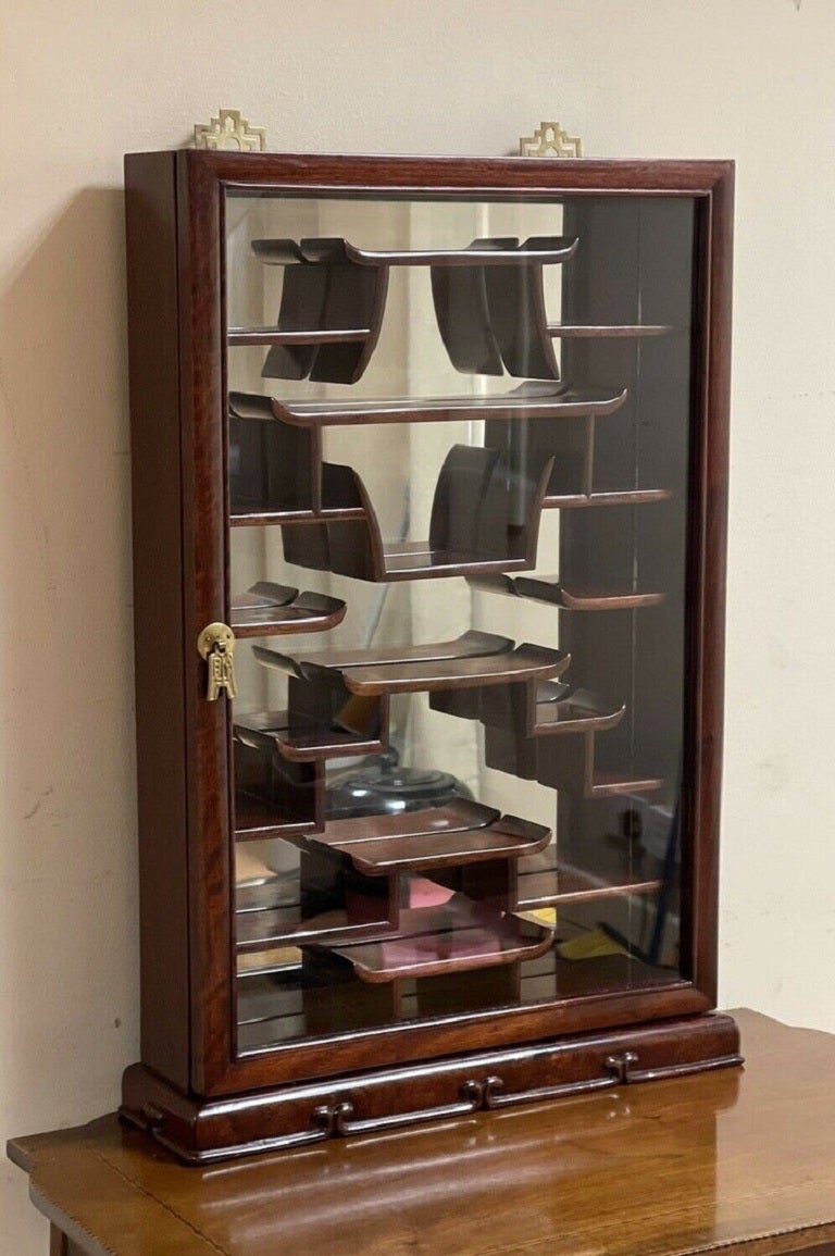 We are delighted to offer for sale this Lovely Asian Chinese Oriental Wall Mount Display Cabinet.

It has to be hung on the wall or stand on something. It can be used as a medicine cabinet or a small display cabinet.

We have lightly restored