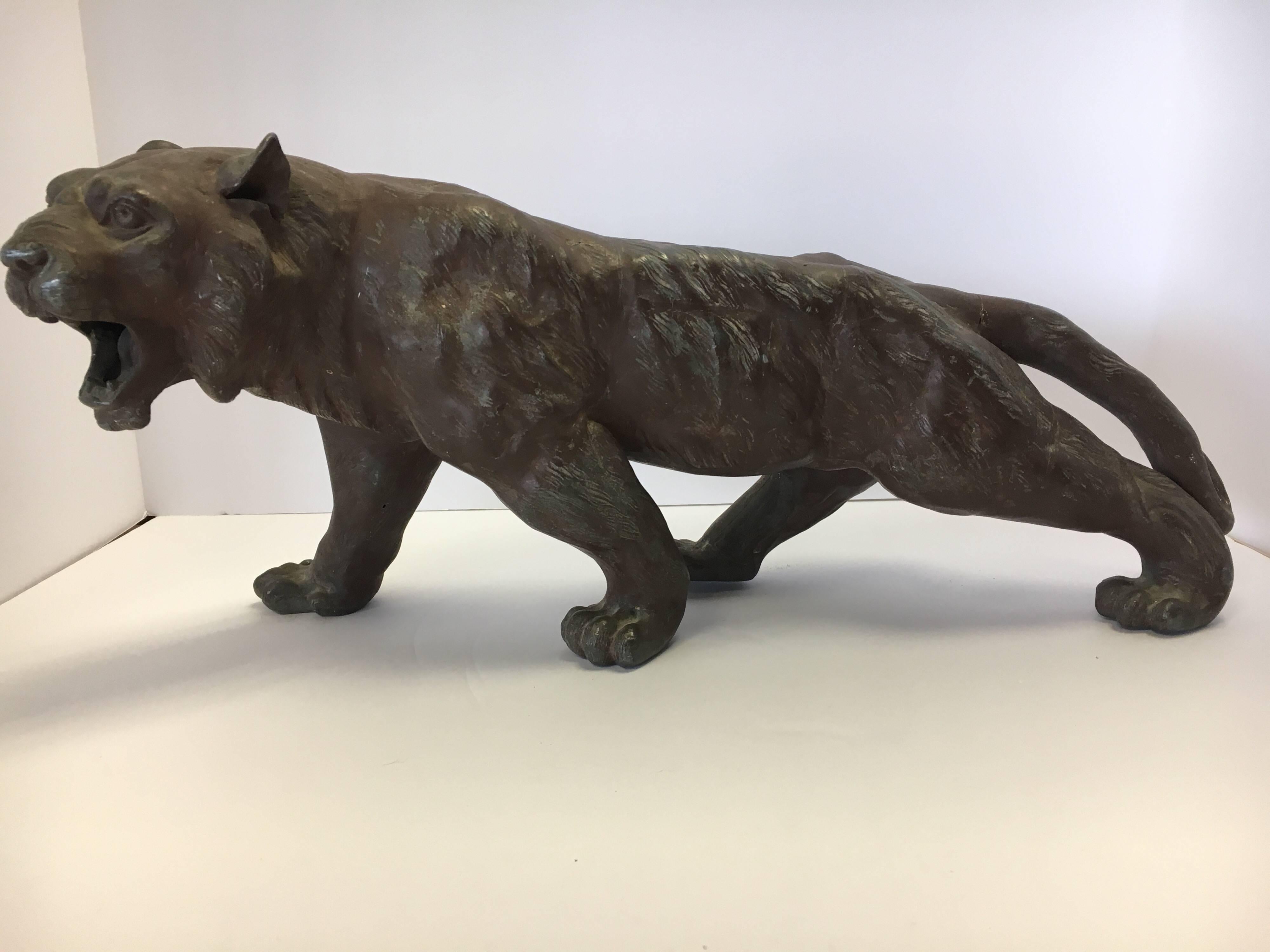 Unusual late 19th century panther/lion sculpture made of metal.