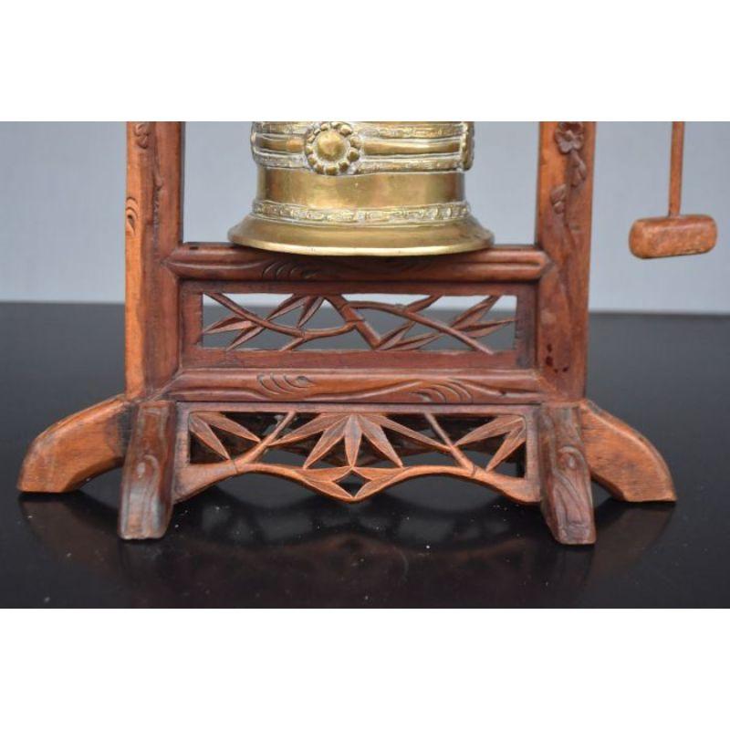 Interior Asian portico prayer bell in carved and openwork wood, 52 cm high by 40 cm wide.

Additional information:
Material: Exotic wood, Metal & wrought iron
Style: Asian
Dimension: 40 W x 40 D x 52 H cm.
 