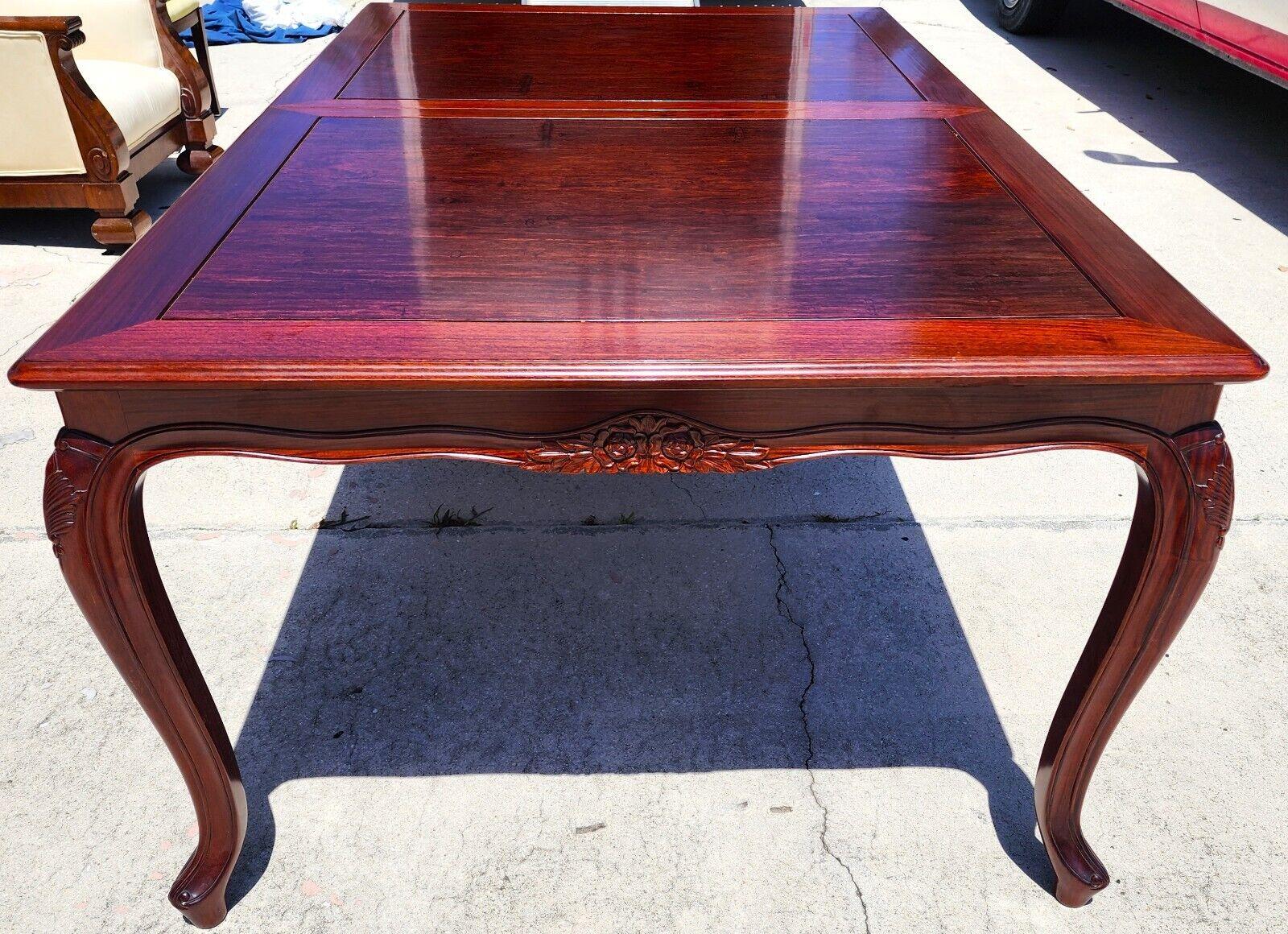 For FULL item description click on CONTINUE READING at the bottom of this page.

Offering One Of Our Recent Palm Beach Estate Fine Furniture Acquisitions Of A
Vintage Asian Chinoiserie Rosewood Dining Table with 2 Leaves 

We also have the matching