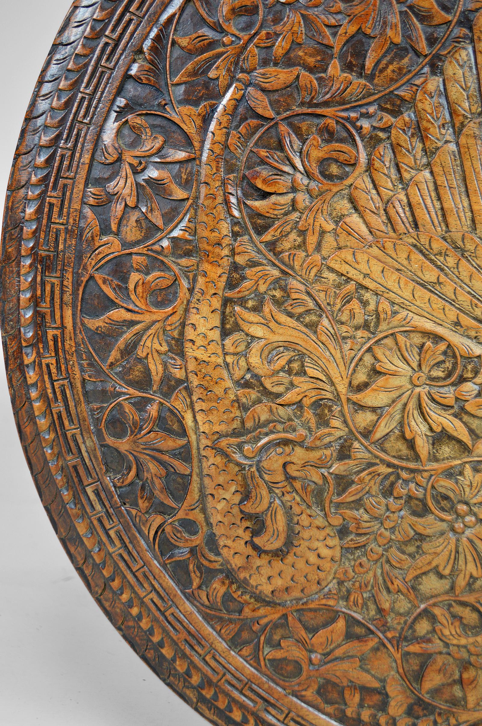 Asian Round Coffee Table Carved with Dragons and Peacocks, Indonesia, circa 1920 For Sale 3