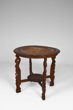 Asian Round Coffee Table Carved with Dragons and Peacocks, Indonesia, circa 1920