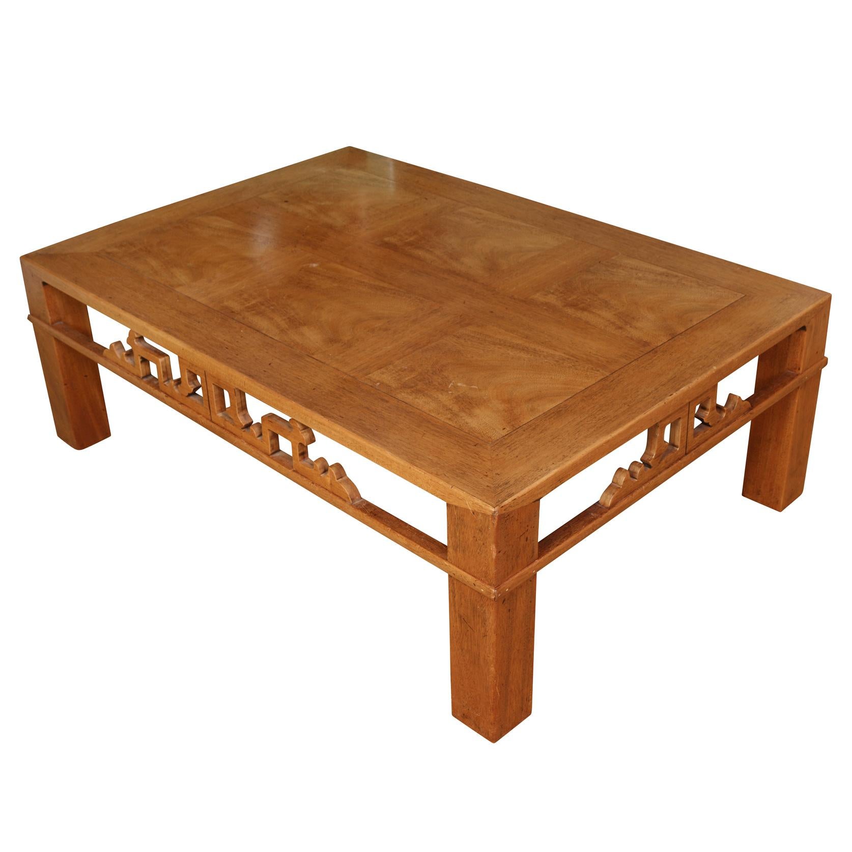A vintage Asian style low coffee table with carved apron and square parquetry top design.