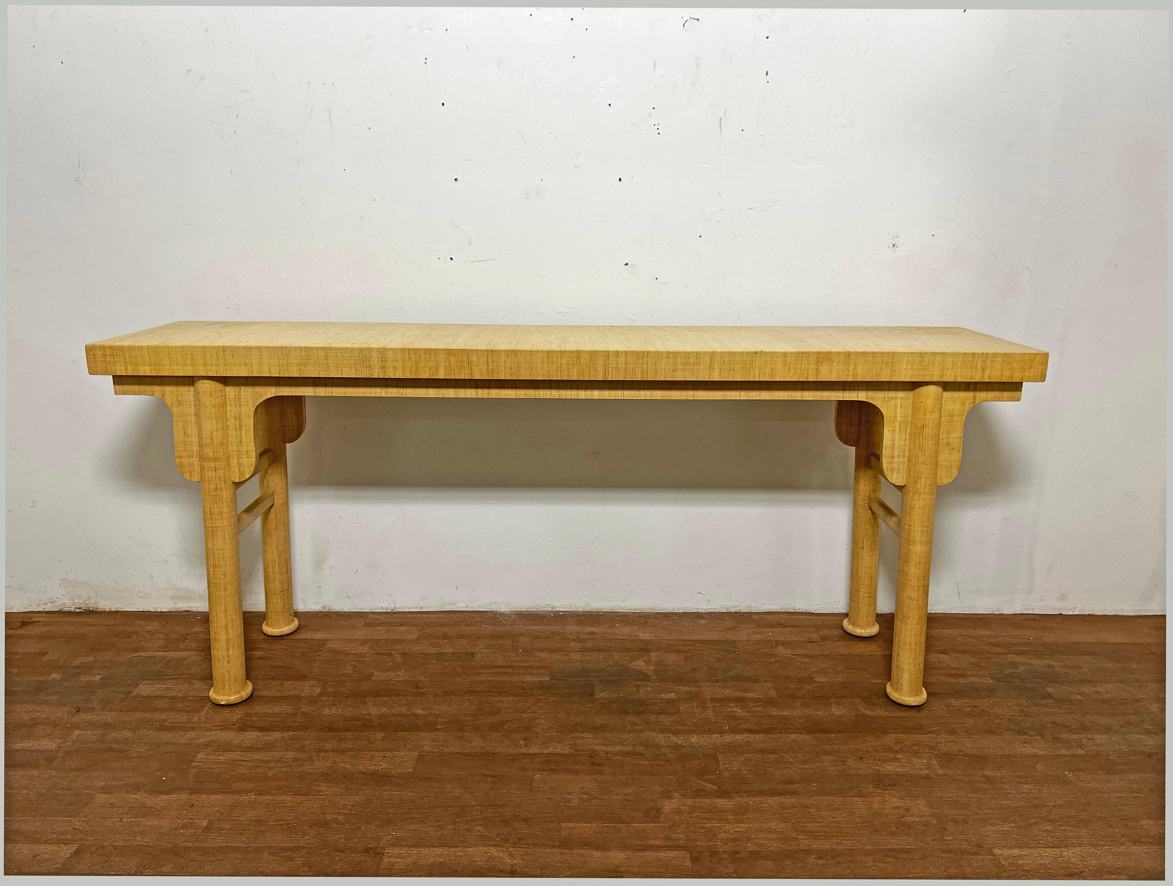 A 1970s linen wrapped console with legs and corbels reminiscent of the classic Chinese altar table form.