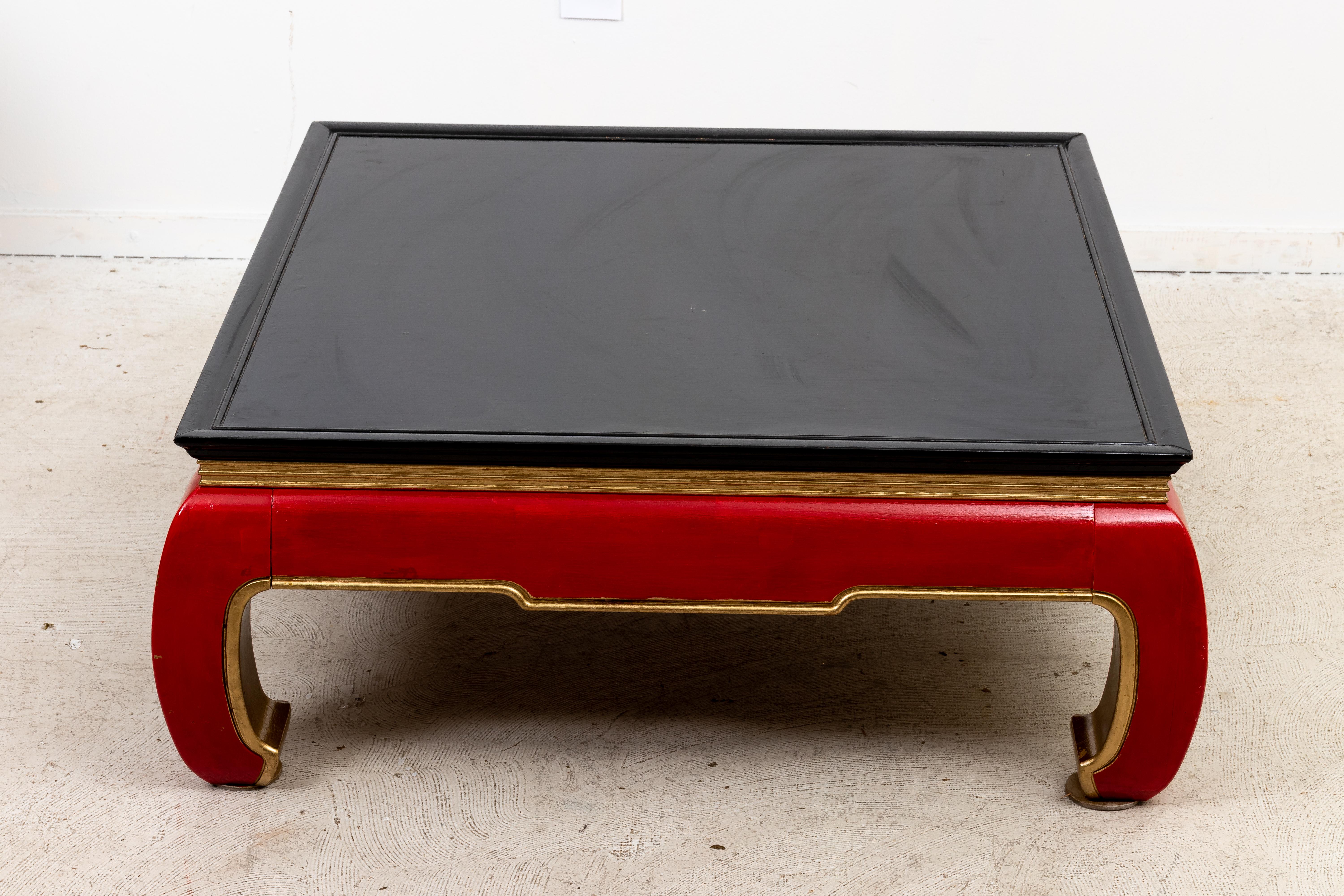 Asian Style square coffee table. Has been repainted at some point in black, red and gold. Some wear to painted finish. Nice overall condition.