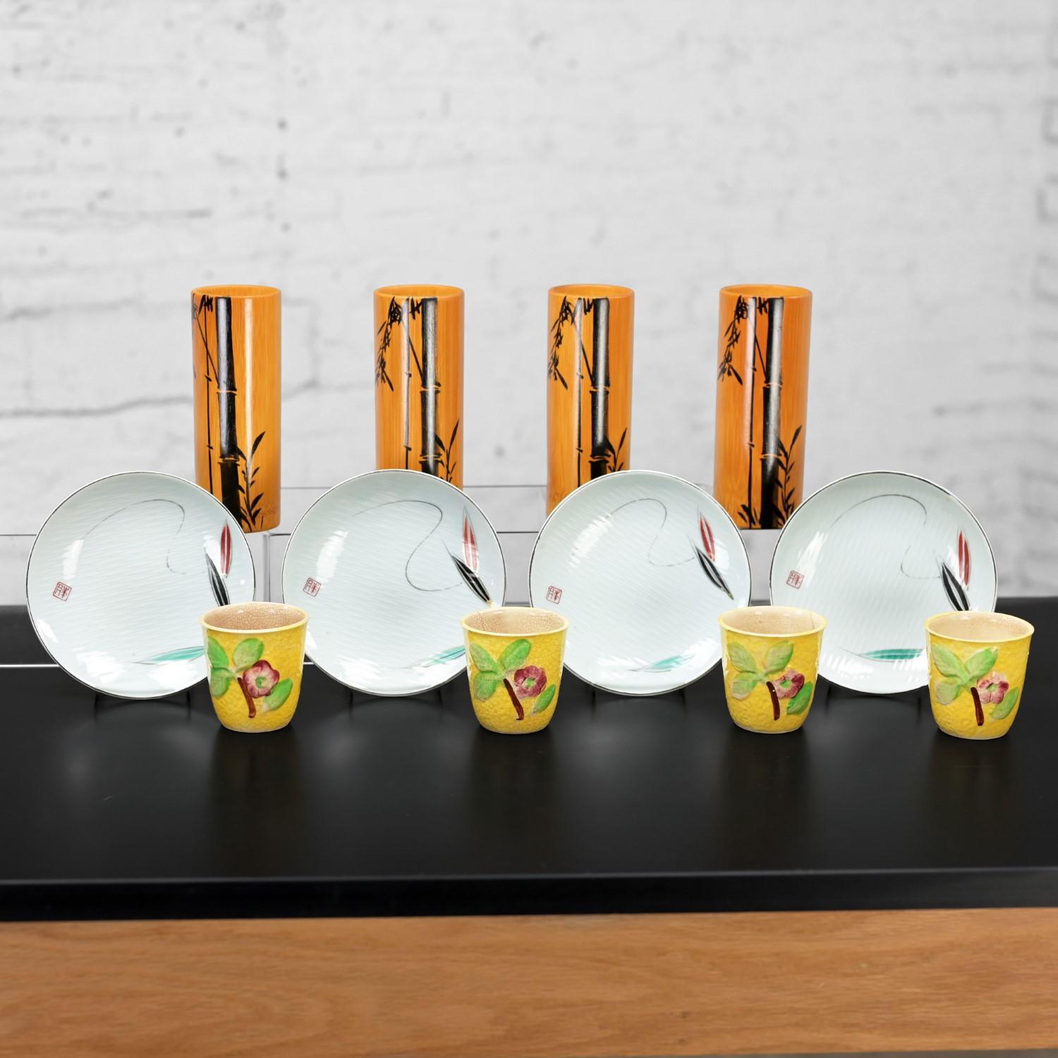 Marvelous vintage tabletop set of 4 natural bamboo tumblers, 4 yellow ceramic saki cups, & 4 porcelain dessert plates with plate stands, all with hand painted Asian details & made in Japan. Beautiful condition, keeping in mind that this is vintage