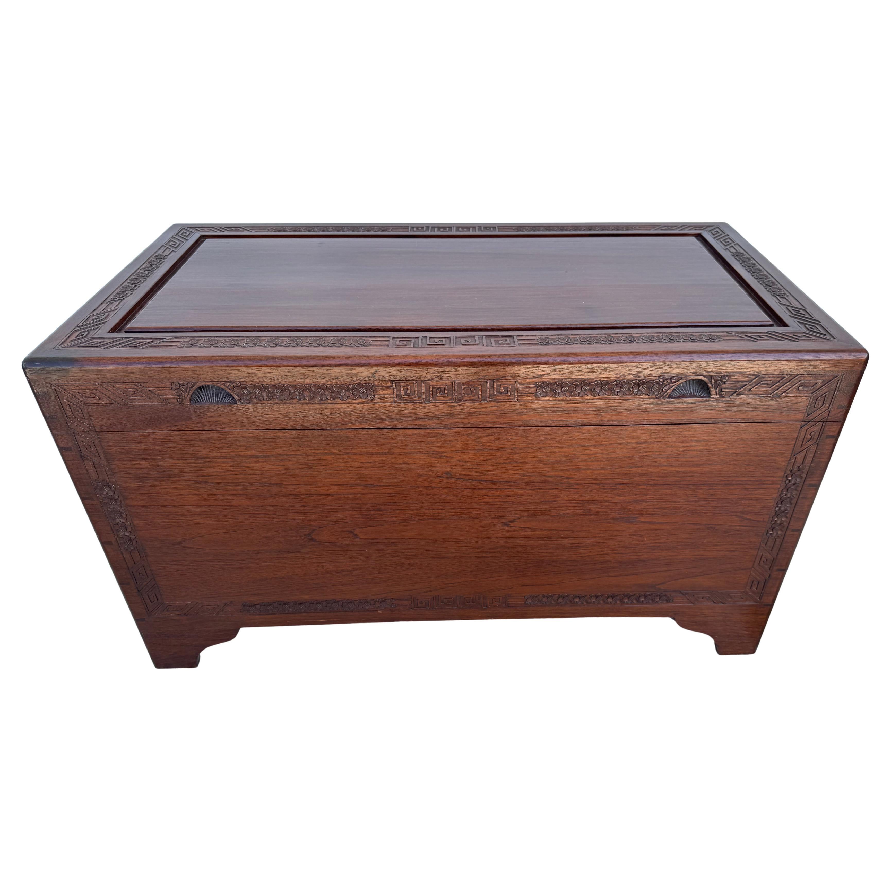 This is a very heavy blanket chest.
The chest is constructed of teak.
The outer edges and the handles are carved in teak.
The inside is cedar. 