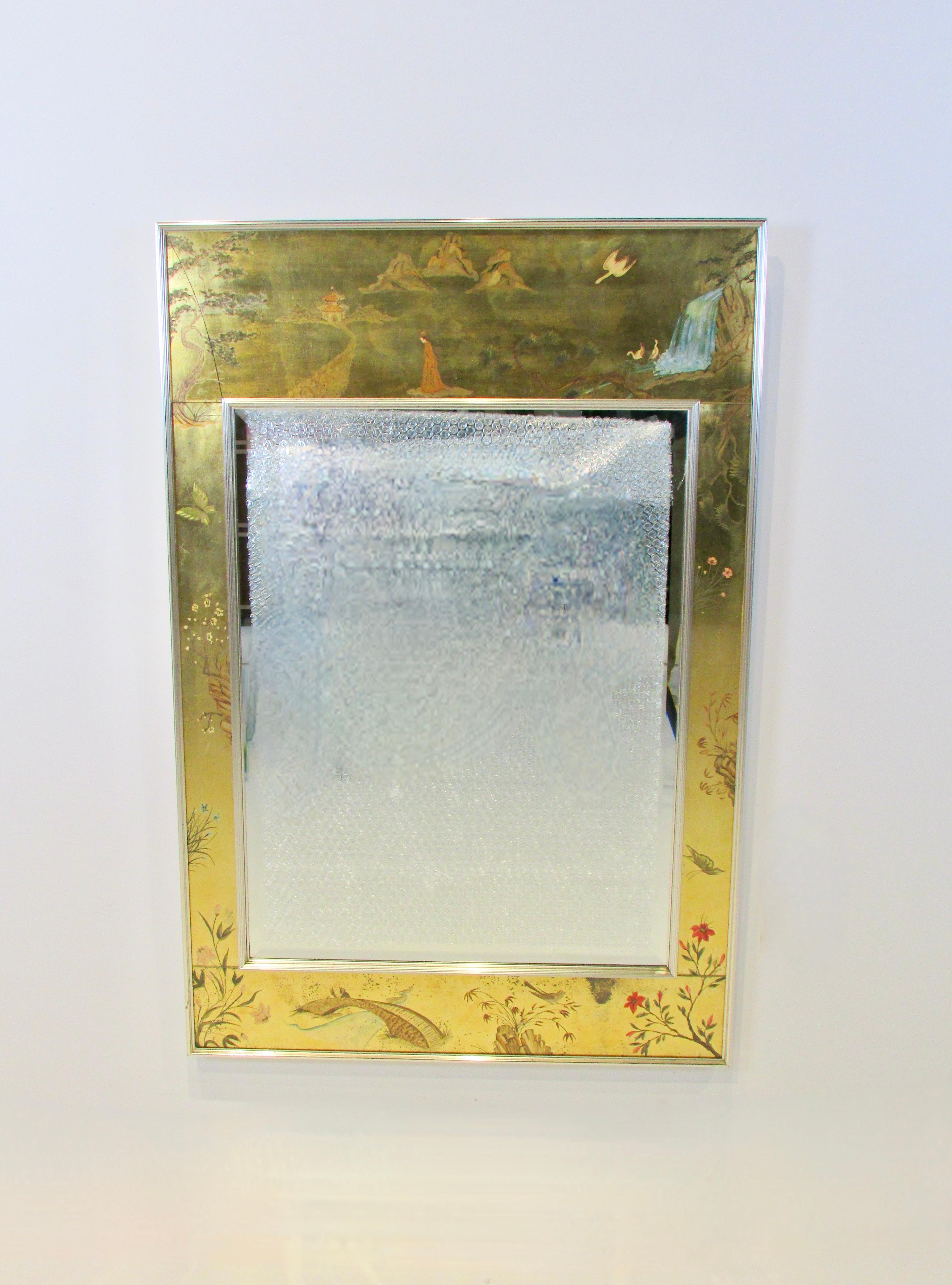 Wall mirror with Asian theme decoration on gold leaf surround . Bright vivid colors clear mirror . There is a crack in the gold leaf upper left corner behind the outer glass .