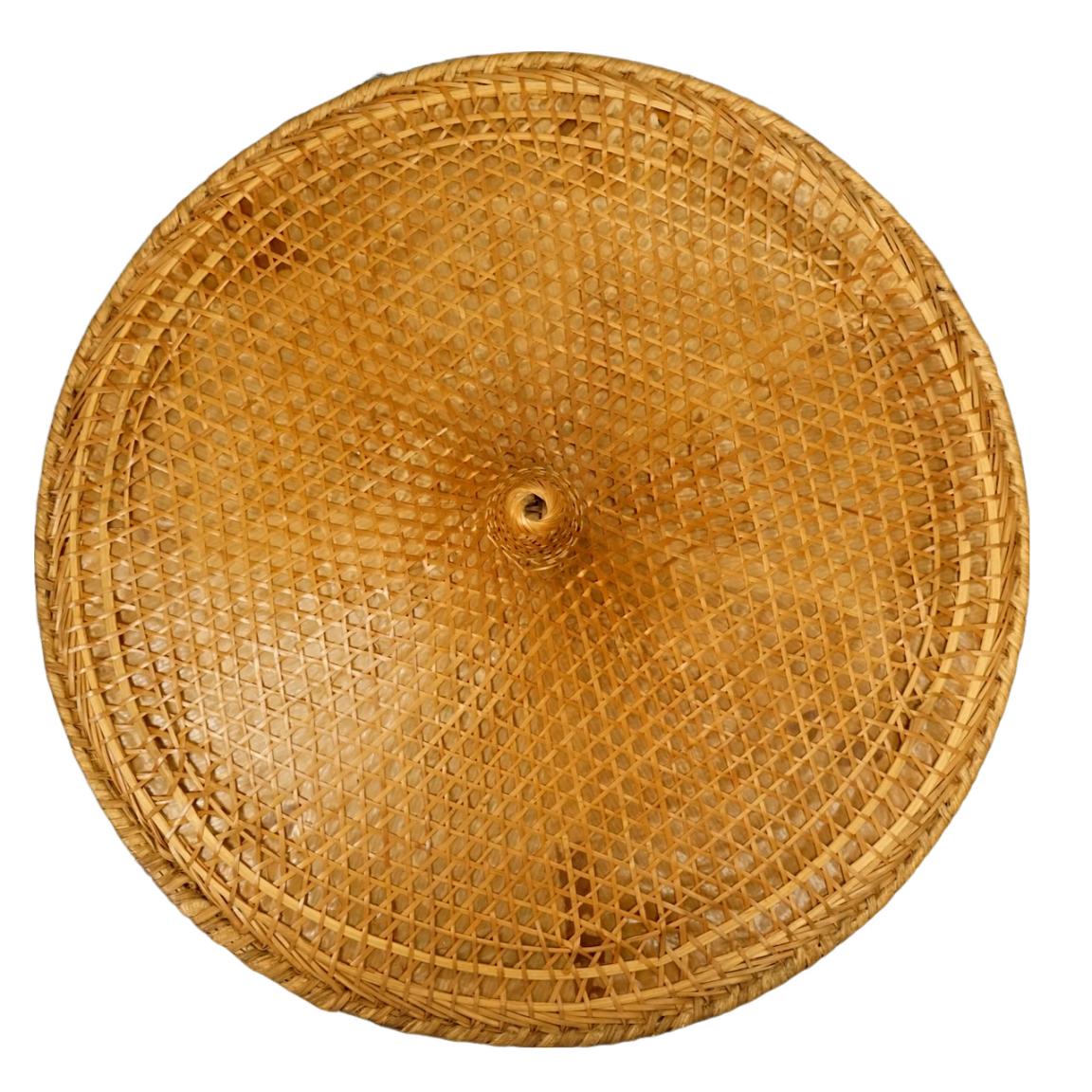 An original Asian wicker conical coolie hat, with an under chin string. Measuring diameter 46 cm / 18.1 inches. It is in very good condition.

The coolie hat is very well made. Circa 1940s. A rare find.