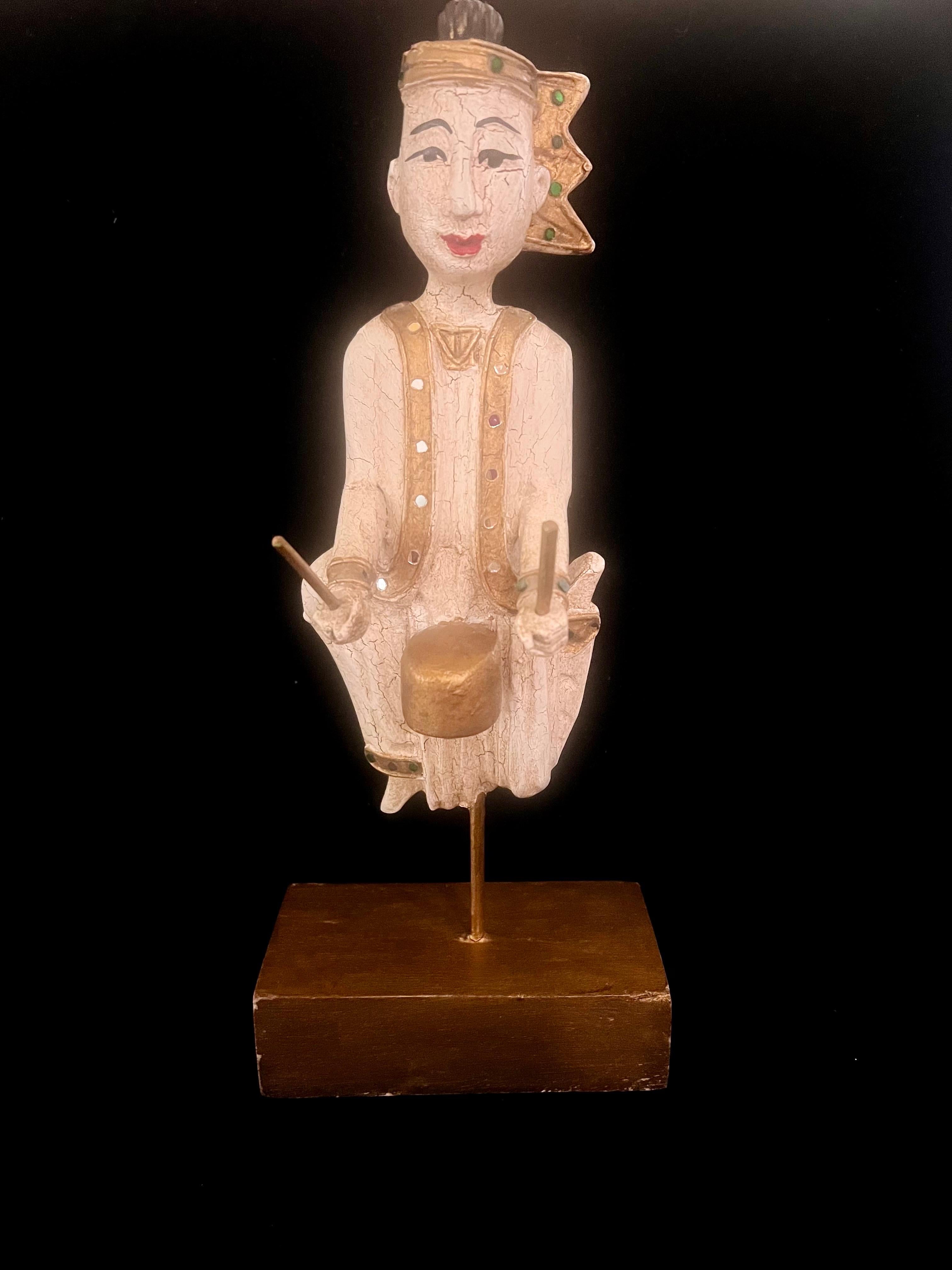Antique wood carved musician sculpture with gold leaf finish and crackle patina, circa 1960's.