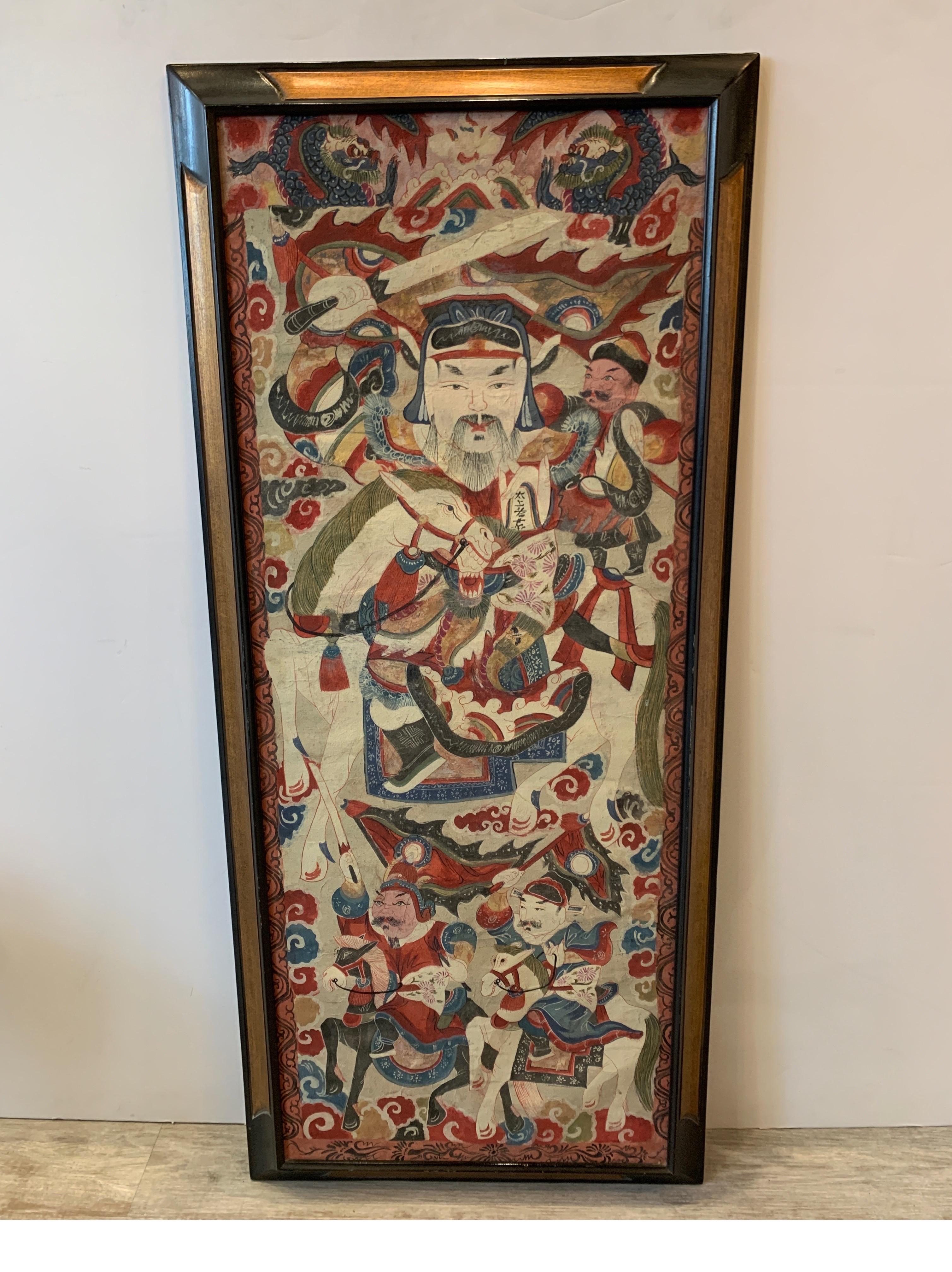 A Chinese watercolor on paper in Iron red and cobalt blue of warriors and nobleman in a later lacquered and gilt wood frame, circa 1920. Some light aging to the paper expected with age.