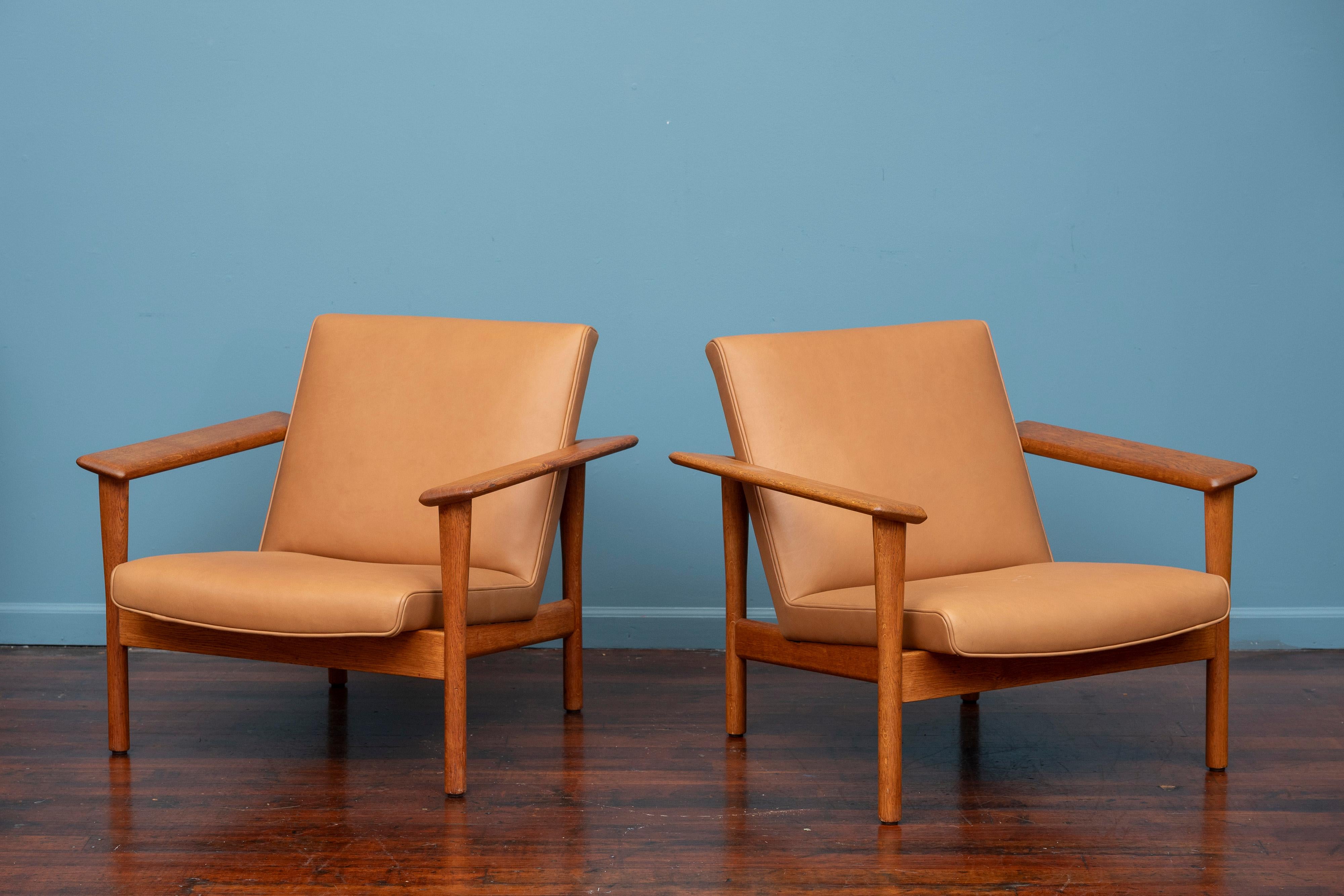 Askel Bender Madsen & Ejner Larsen lounge chairs for Willy Beck, Denmark. Very rare pair of chairs by Danish Architects and designer's Askel Bender Madsen & Ejner Larsen. High quality construction techniques and materials, executed in sculpted teak