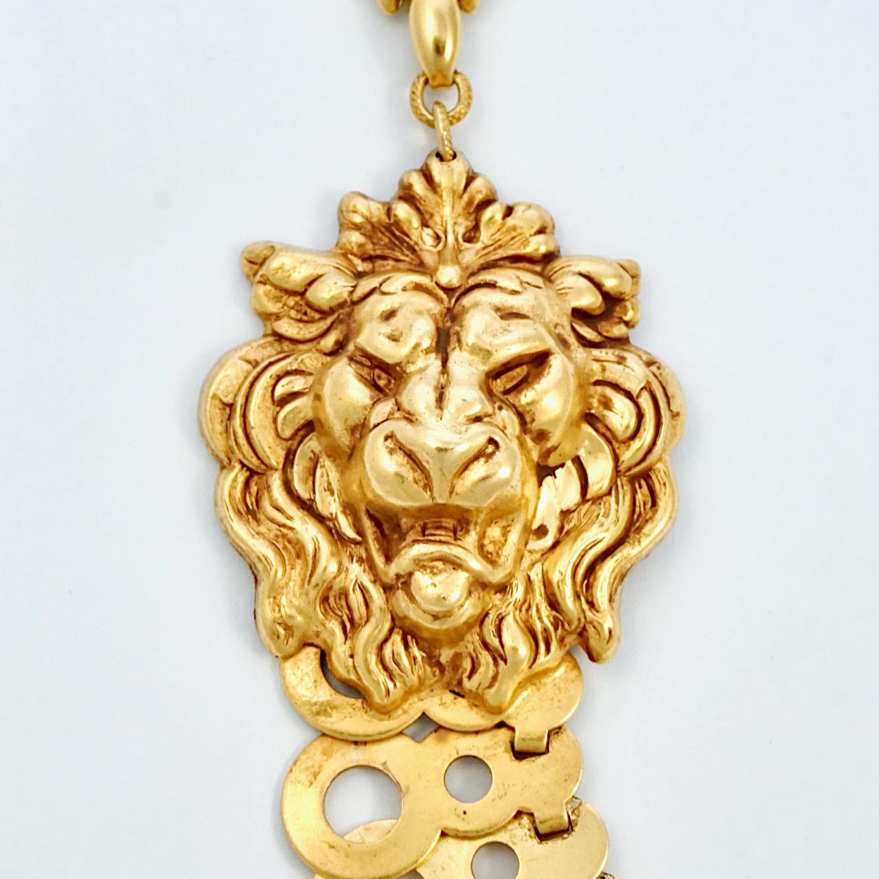 Fabulous Askew London antiqued gold plated necklace featuring two lion heads with filigree backs joined together by punched link chain. The back has pip link chain with a lovely bee and flower clasp. Measuring necklace length 52.5 cm / 20.6