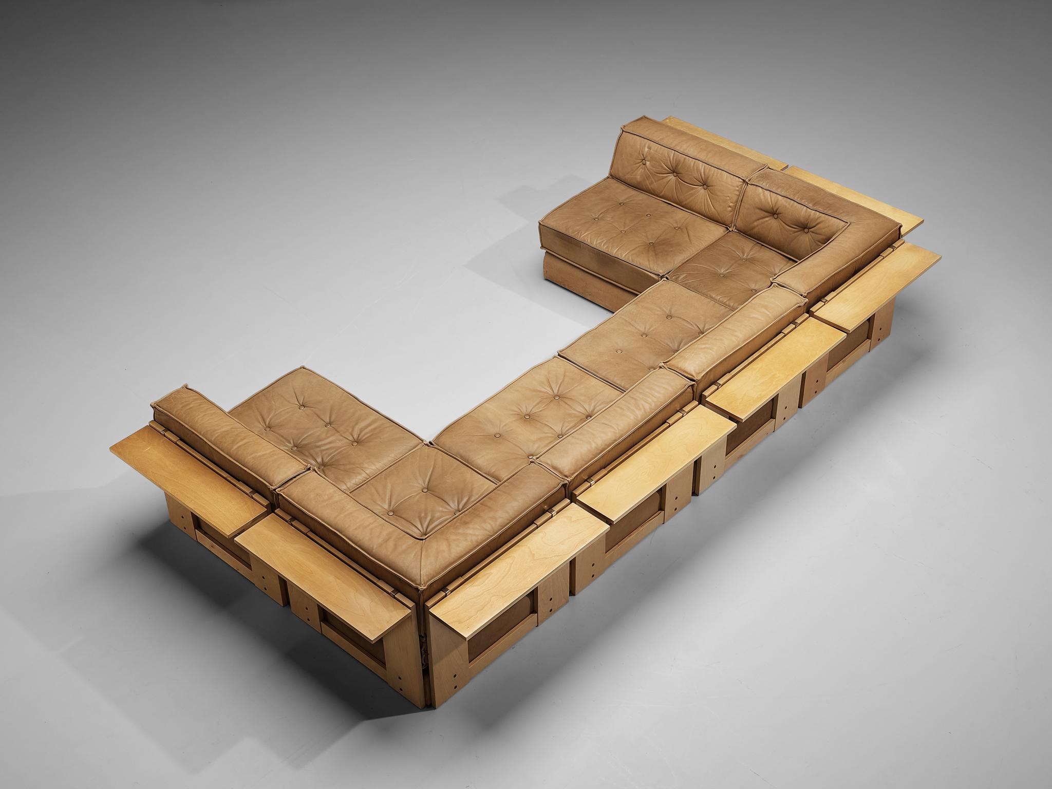 Asko, sectional sofa, leather, birch, brass, Finland, 1960s

This high-quality sectional sofa is produced by Asko and contains four regular elements and two corner elements, making it possible to arrange this sofa to your own wishes. The design is