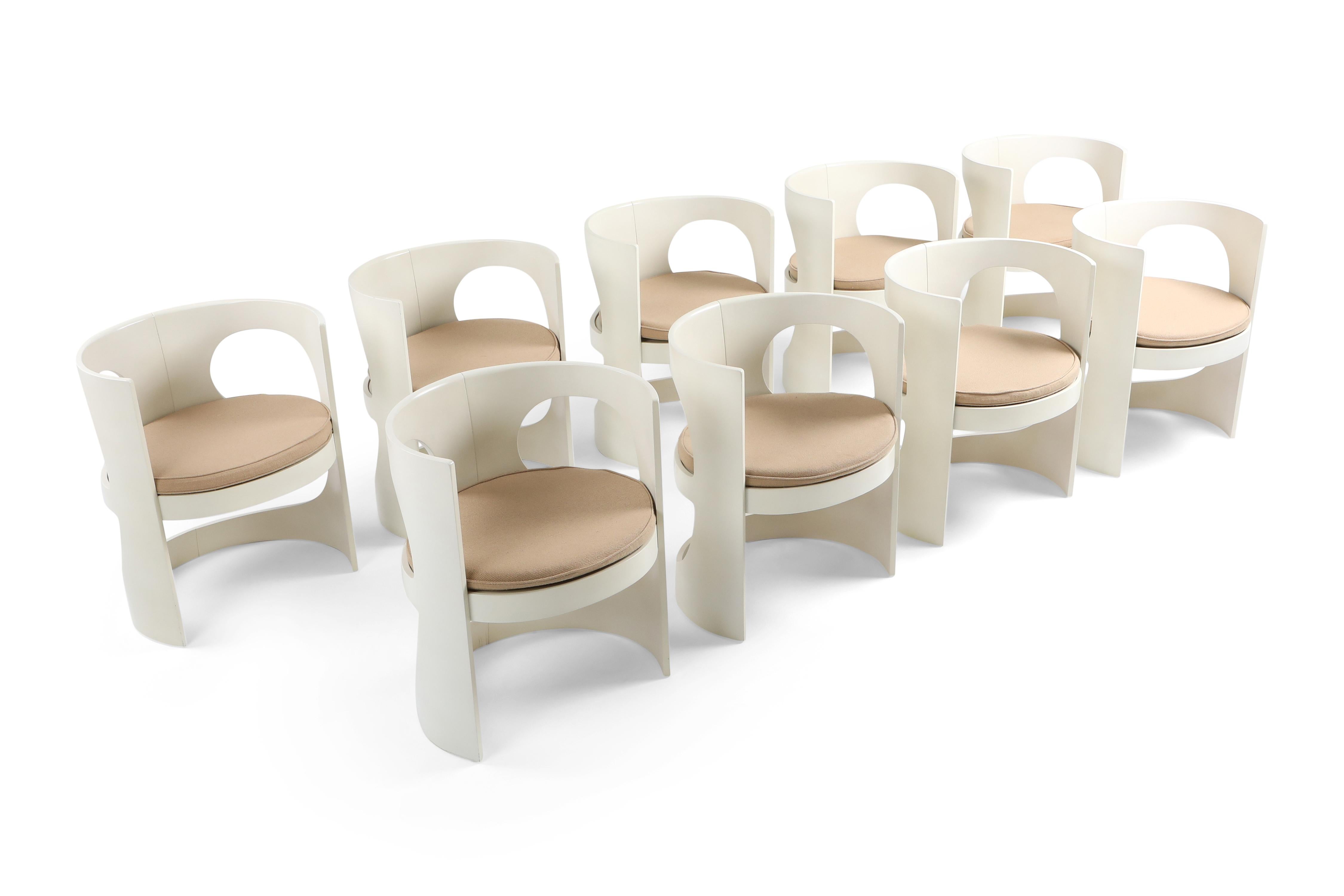 Space Age pre pop armchairs designed by Arne Jacobsen and manufactured by Asko, Finland 1969. 

This Scandinavian Mid-Century Modern set of nine chairs is extremely rare. The chairs are in off white lacquered plywood and have off white newly