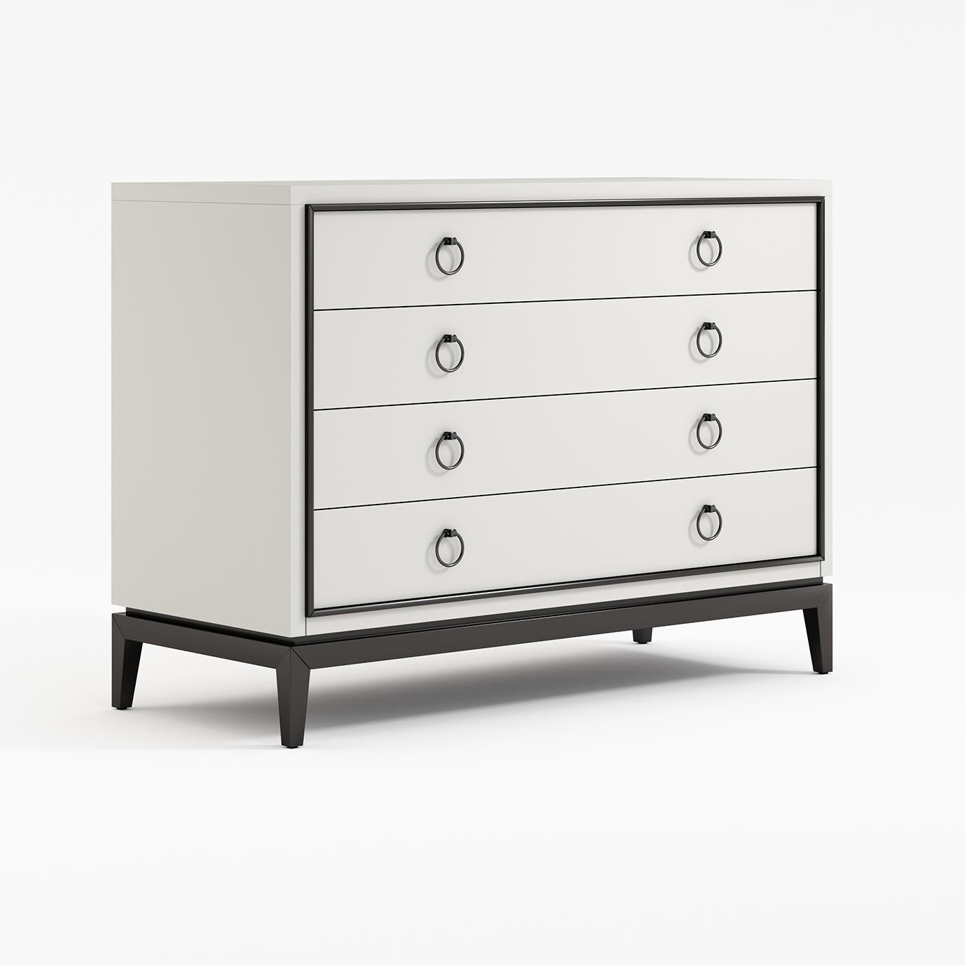Timeless elegance and a striking color block combination are the distinctive traits of this chest of four drawers. The solid wood base and profiles are adorned with black lacquer, while the sides, top, and front panels of the drawers are in white