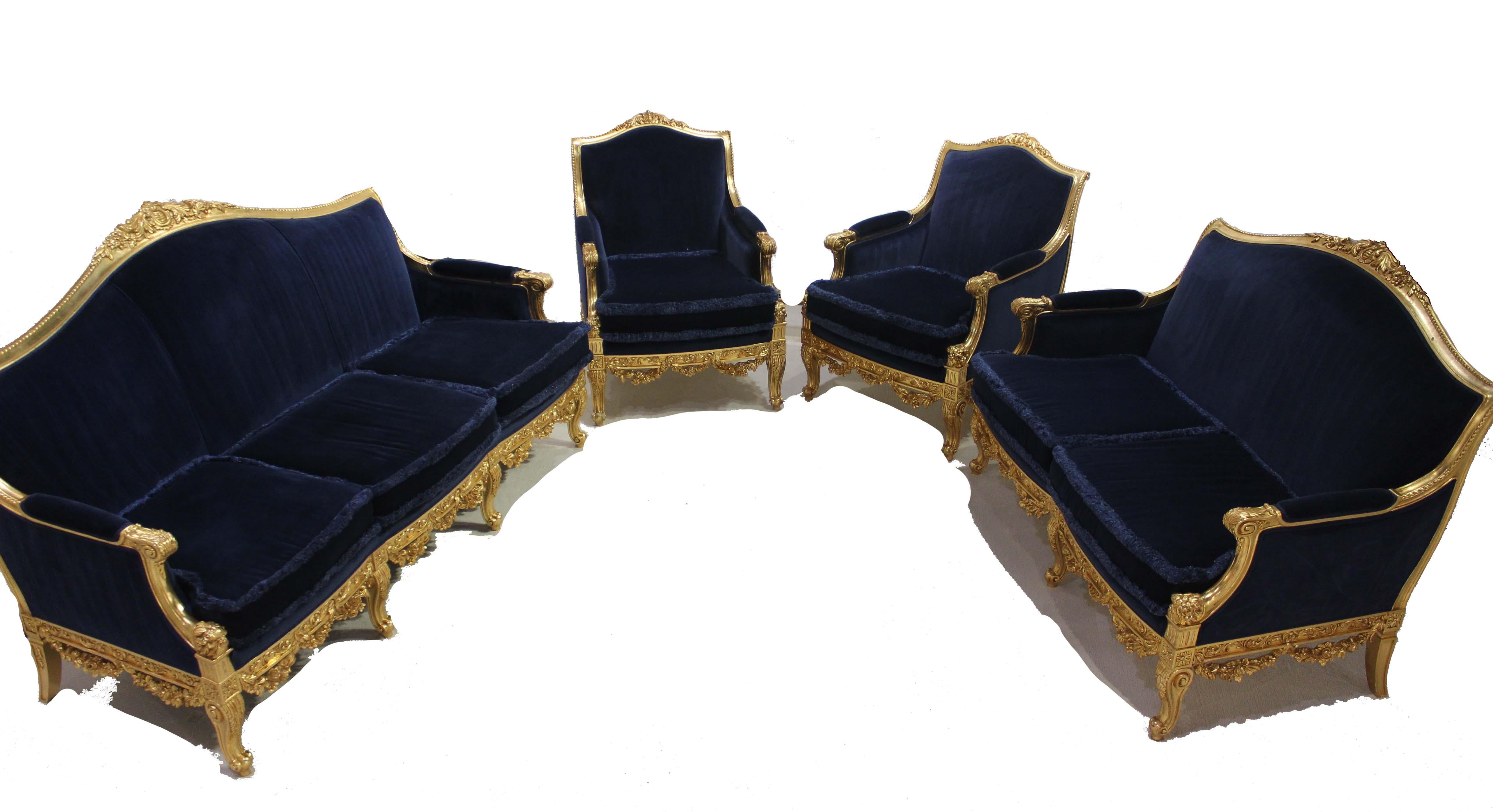 Suite of settees and chairs, upholstered royal blue velvet, trimmed with brush fringe, made in Italy by the famous make ASNAGHI, in the style of Louis XVI.
Hand carved and gilded wood, with the Louis XVI flowers garland on each side.
One 3 seat