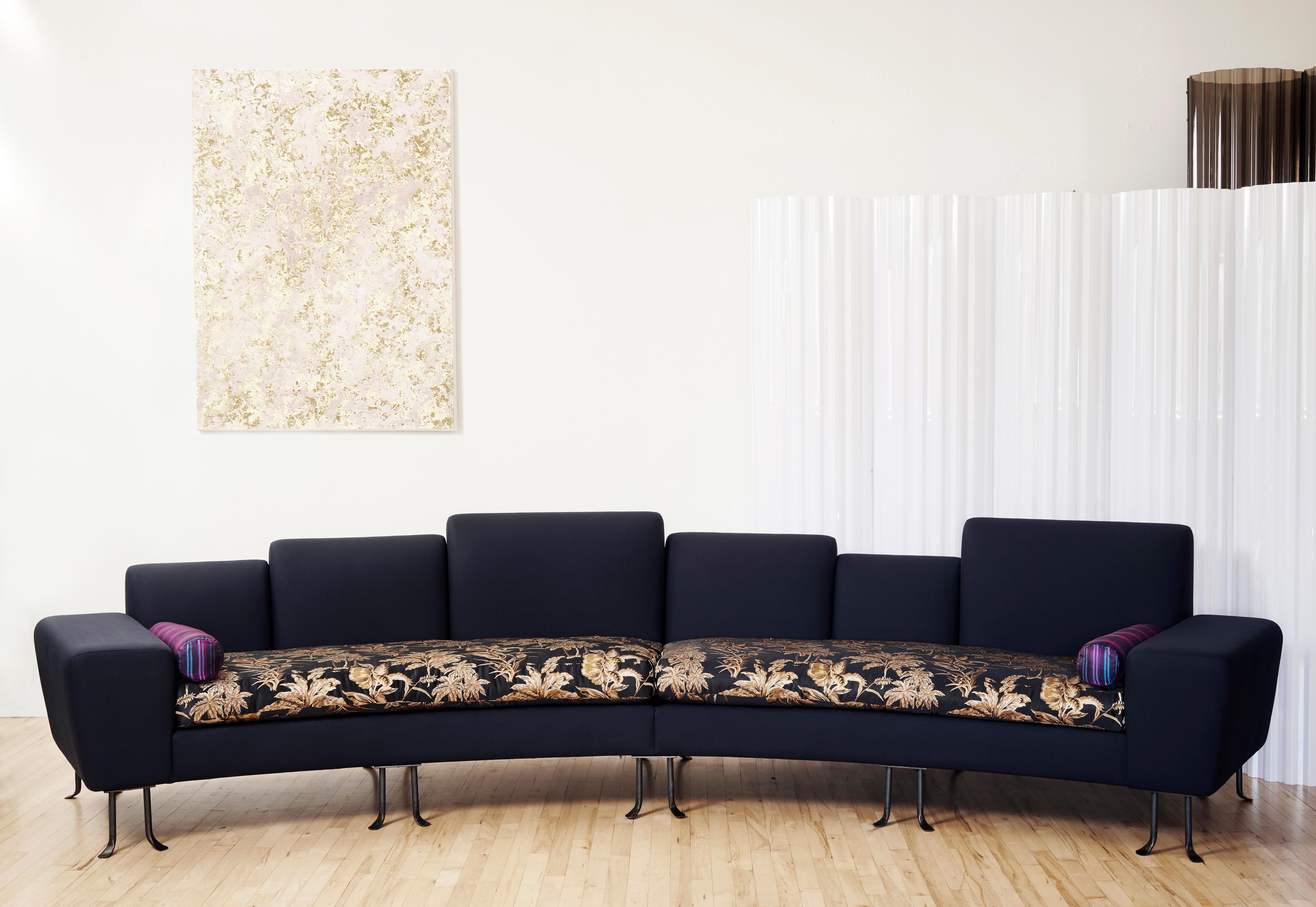 The aspect upholstery collection takes its inspiration for the gently curving lines, and on the sofa, varying seat-back heights, from the round-edge windows of the nearby cast iron buildings in soho. Nita, as well as the entire aspect upholstery