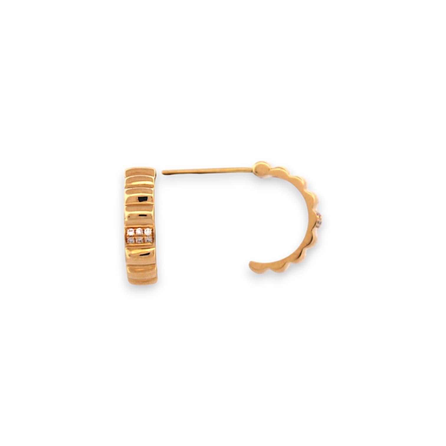 Chic and endlessly wearable, the Aspen Earrings by Mountain Song Jeweler are the perfect everyday luxury. Crafted in glowing 18k yellow gold, these modern half hoop post earrings feature .10 carats of natural round diamonds, delicately set to