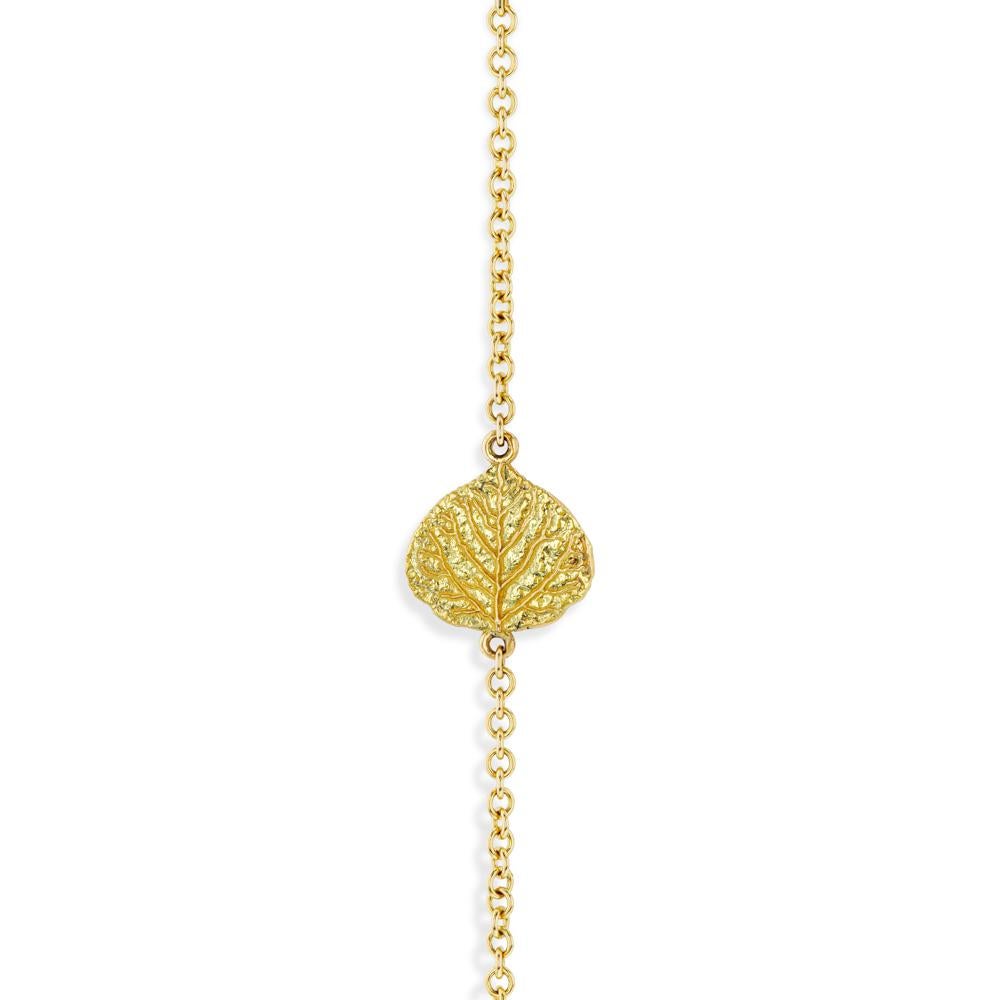 This fantastic 32 inch yellow gold station necklace features seven beautiful Aspen leaves created in 18k yellow gold.