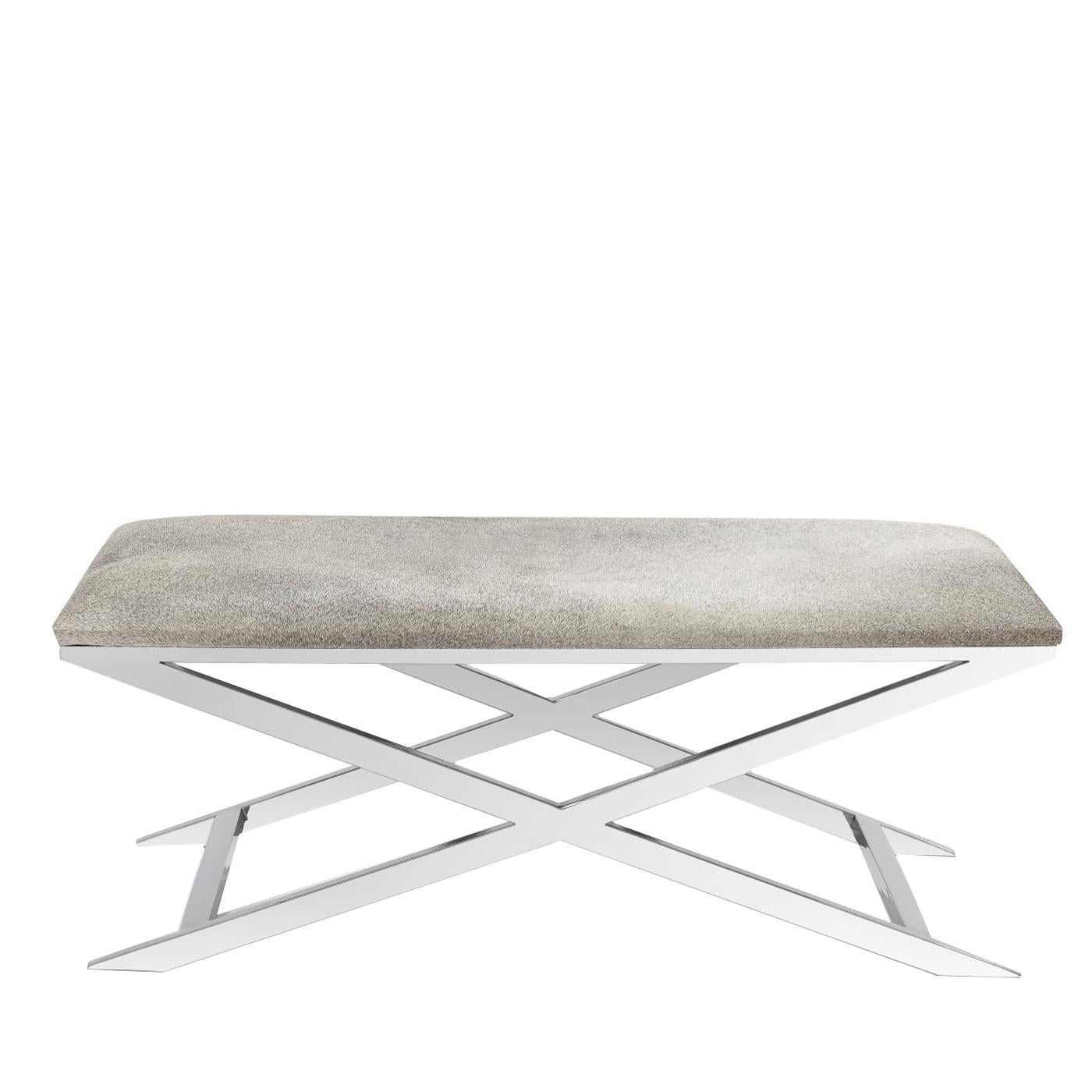 This extremely elegant, thoroughly modern ottoman features a light gray seat and silver chrome frame, for a minimalistic, ethereal look. The diagonal lines of its base add energy and movement to the solid, minimalistic restraint of its cover. Its
