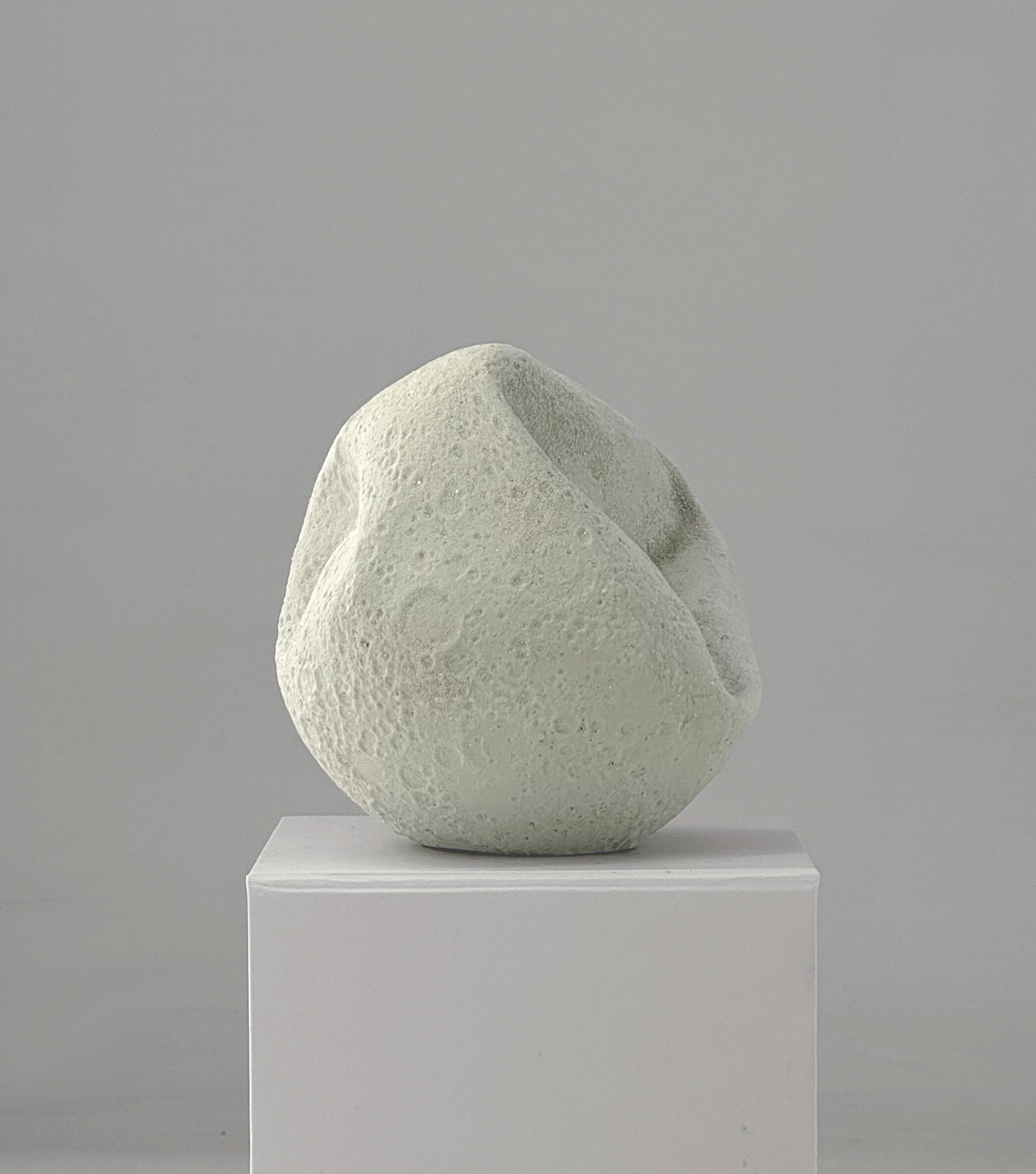 M10-w
Miniature sculpture inspired by the Deflated Moon Series. Reflecting on how humans treat Earth, the artist imagines the possible effects of human presence in outer space. The sculpture does not just represent moons, but any celestial bodies