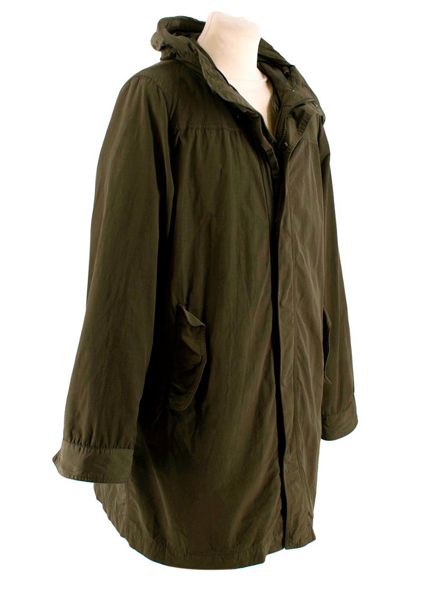 Aspesi Khaki Green Hooded 2in1 Rain Jacket

- Hooded rain coat
- Two front flap buttoned pockets
- Three internal pockets (one zip two button)
- Detachable internal jacket with buttons around the edge (see image)
- Zip hood pocket 
- Drawstring hood