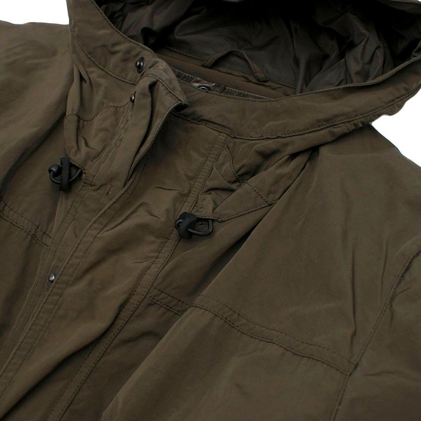 green hooded jacket