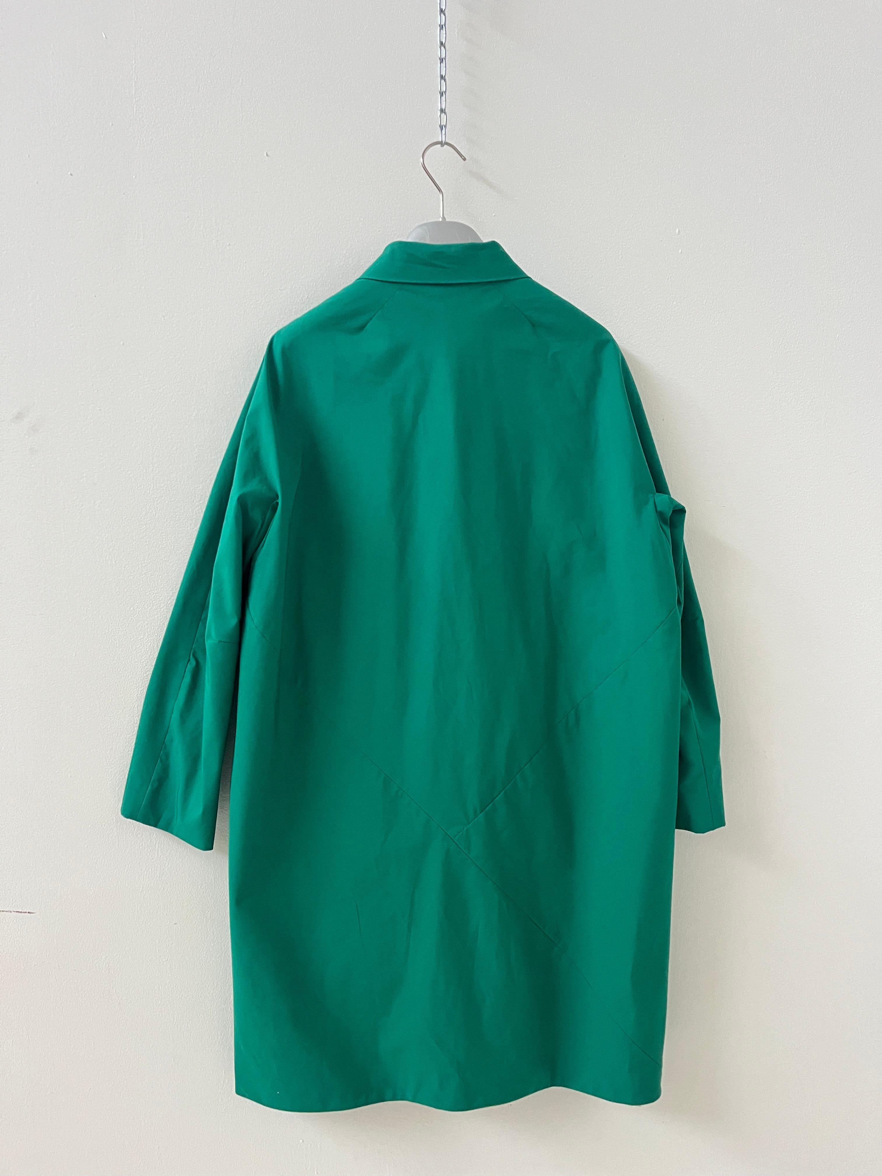 This rare Aspesi “Mostacciolo” coat embodies the essence of functional elegance. Designed with a clean, minimalist silhouette, it reflects the brand’s philosophy of quiet luxury and understated sophistication.

What makes this piece special is its