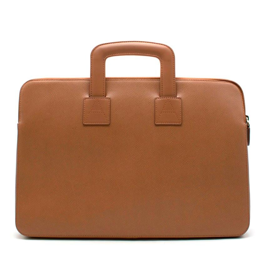 Aspinal of London Tan Connaught Document Case

- Tan Document Case 
- Italian calf leather in smooth tan
- Retractable top handles
- One zipped central compartment
- One zipped pocket on the interior
- One zipped pocket on the exterior
- Two mobile