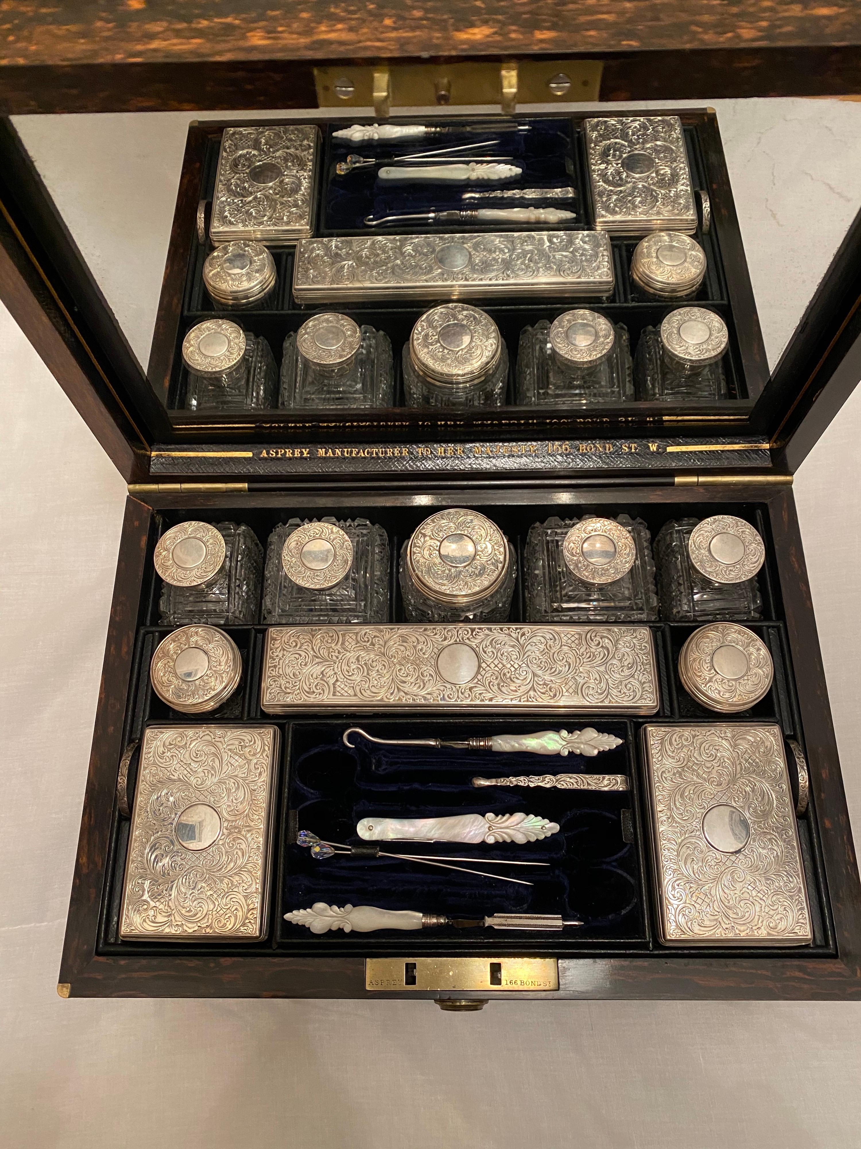 A  truly magnificent and original dressing box by Asprey - 166 Bond Street Manufacturers to HM The Queen. 

Hallmarked 1862, this is the same year as The Great London Exposition and Asprey was awarded The Queen Victoria Royal Warrant for their