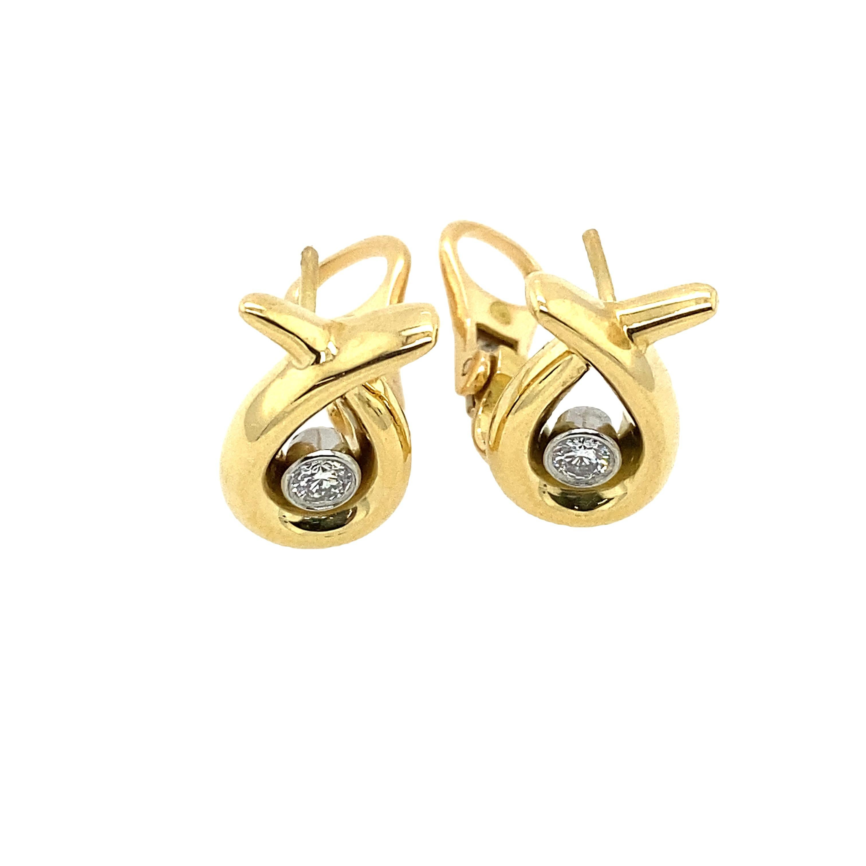 This Asprey pair of earrings was designed to be perfect for everyday earrings or occasions. 
It features a total of 0.20ct diamonds mounted on an 18ct yellow gold beautiful setting.
Earrings Dimension: 15mm x 9mm
Total Diamond Weight: 0.20ct
Diamond