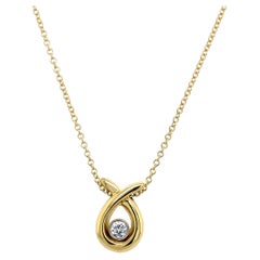 Collier en or jaune Asprey 18ct serti d'un diamant rond de taille brillant, 0.30ct