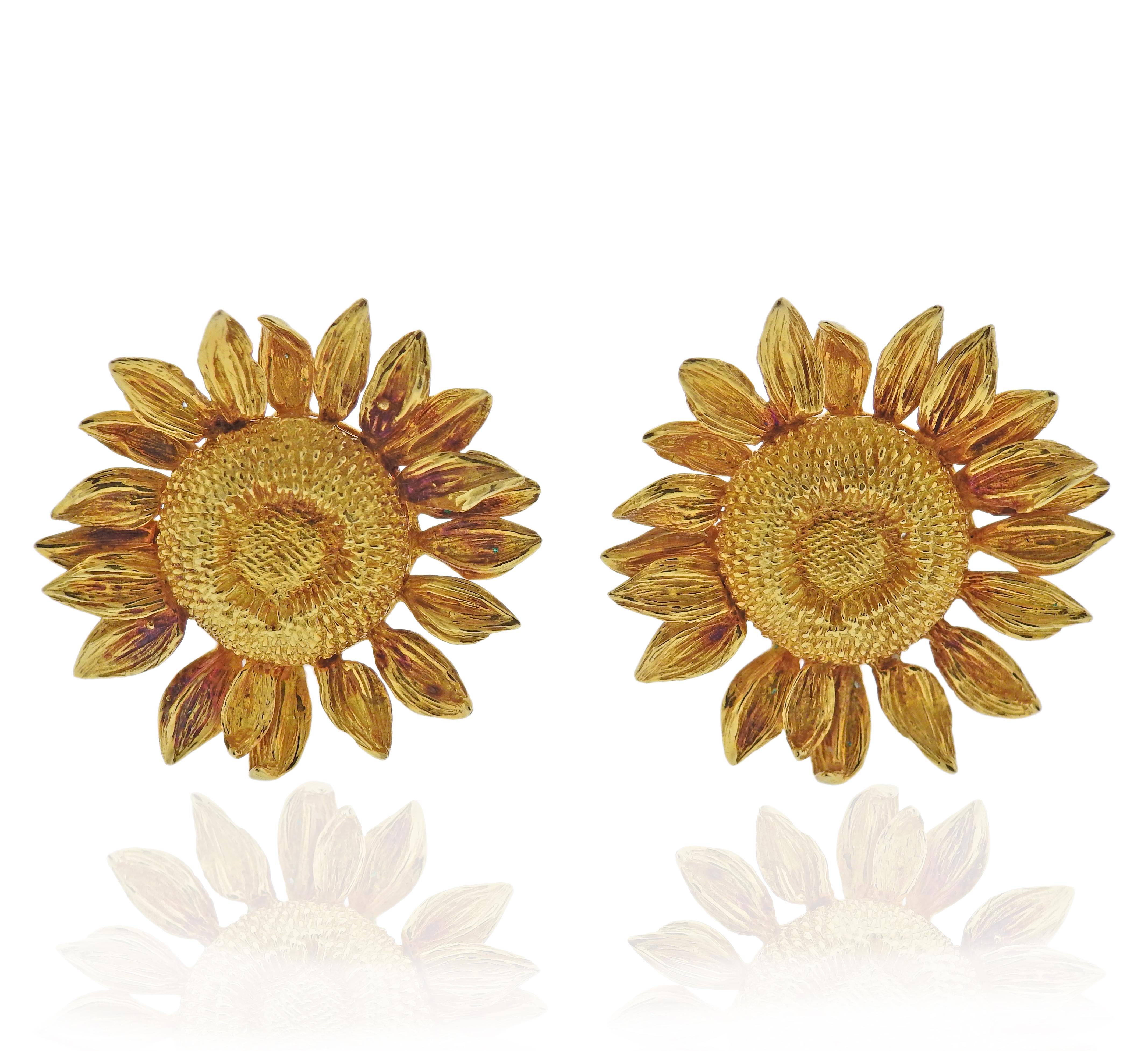 Pair of 18k gold sunflower earrings by Asprey. Measure 32mm in diameter. Marked Asprey, English marks and 750. Weight: 23.5 grams. 