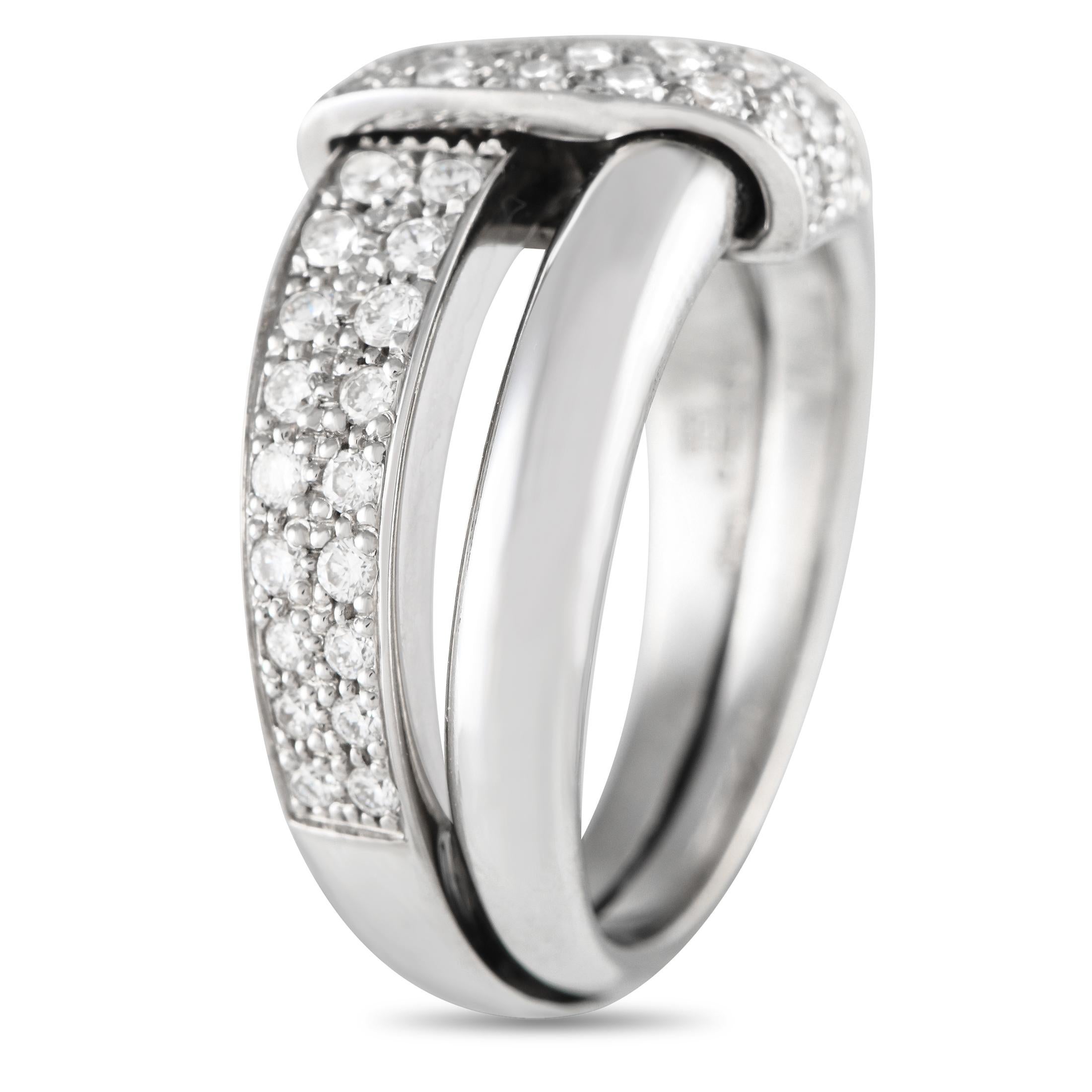 A sleek 18K White Gold setting with a stylish wrapped accent makes this Asprey ring a uniquely elegant piece will continually impress. Inset Diamonds with a total weight of 0.65 carats add visual impact to this impeccable accessory, which features a