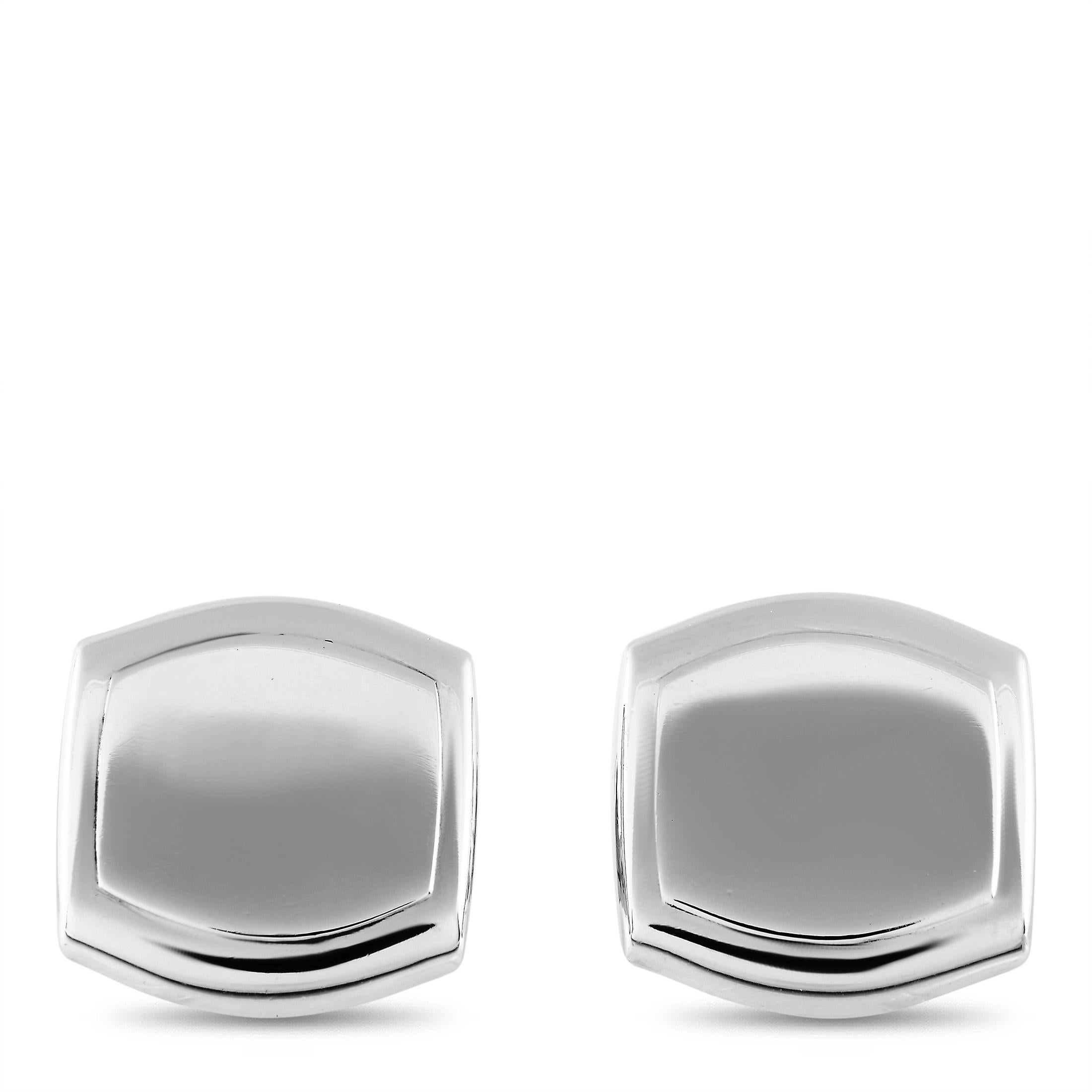 These Asprey cufflinks are crafted from 18K white gold and each of the two weighs 12.55 grams. The cufflinks measure 0.6” in length and 0.7” in width.

Offered in estate condition, this pair of cufflinks includes a gift box.