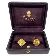 Gemelos Asprey de oro amarillo de 18 quilates con diseño de damero