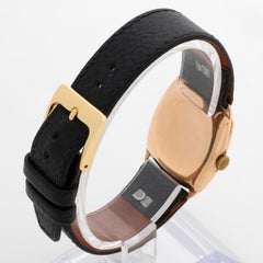 Reloj de pulsera Asprey de oro amarillo de 9 ct, esfera árabe, suizo de 15 rubíes, circa año 1930.