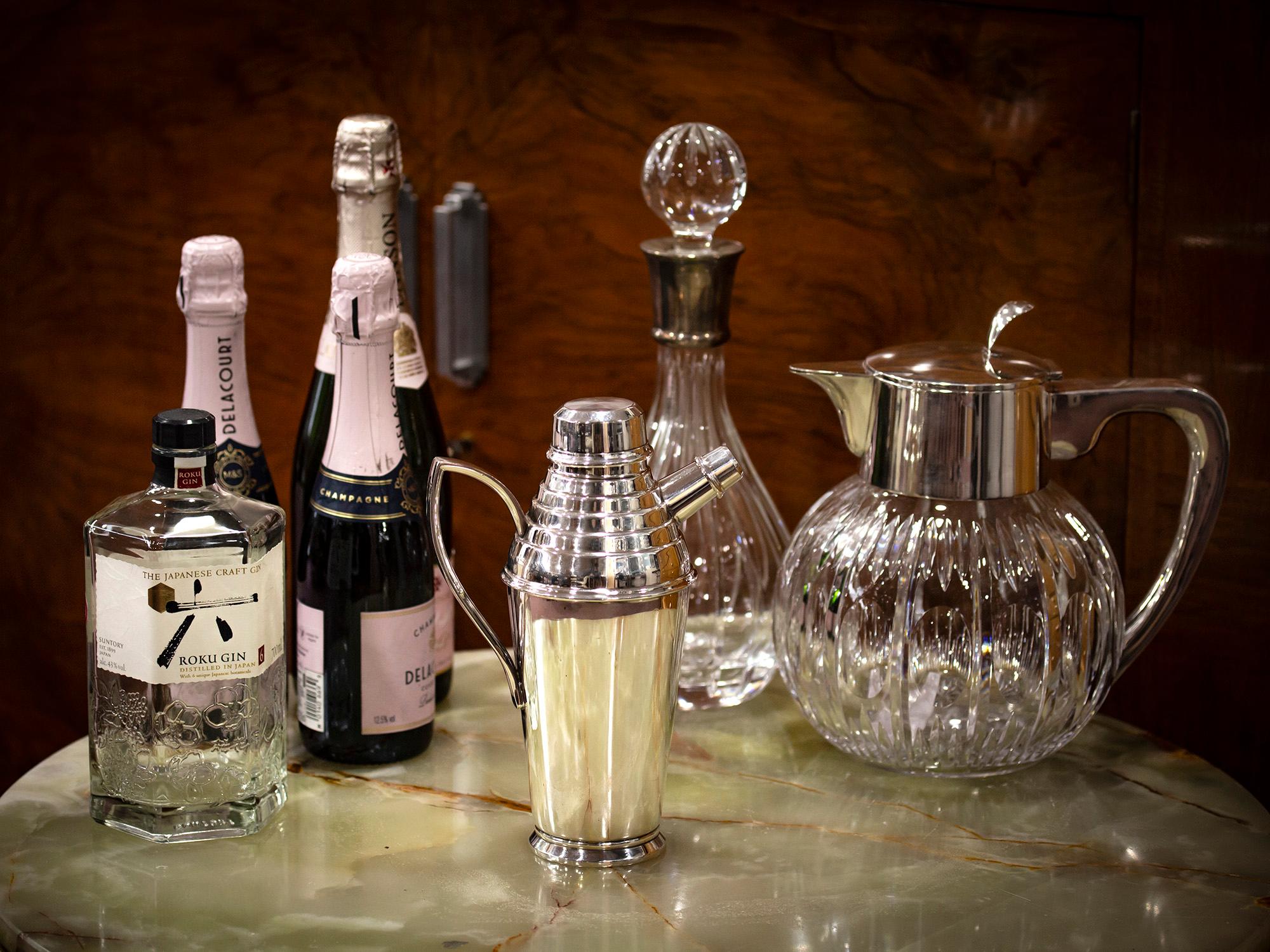 With Tilt Pour Action 

From our Barware collection, we are thrilled to offer this Asprey silver plated Cocktail Shaker. The shaker of milk churn style with long pointed handle and capped spout finished with a stepped body up to a chamfered lid. The