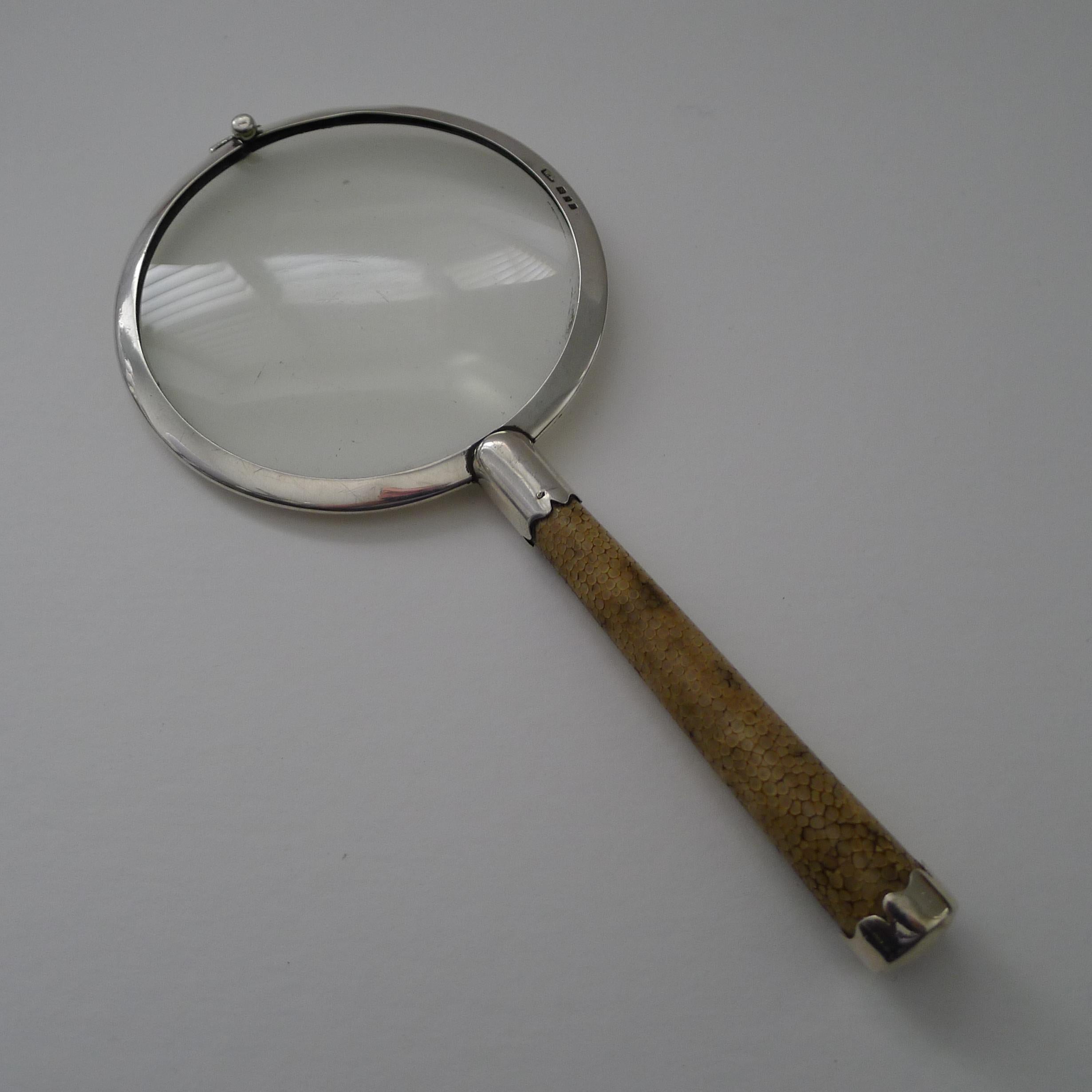 A magnificent magnifying glass by the creme de la creme of English retailer's, Asprey of Bond Street, London.  The silver is fully hallmarked for London 1928 together with the maker's mark W.M.  The silver is also signed 